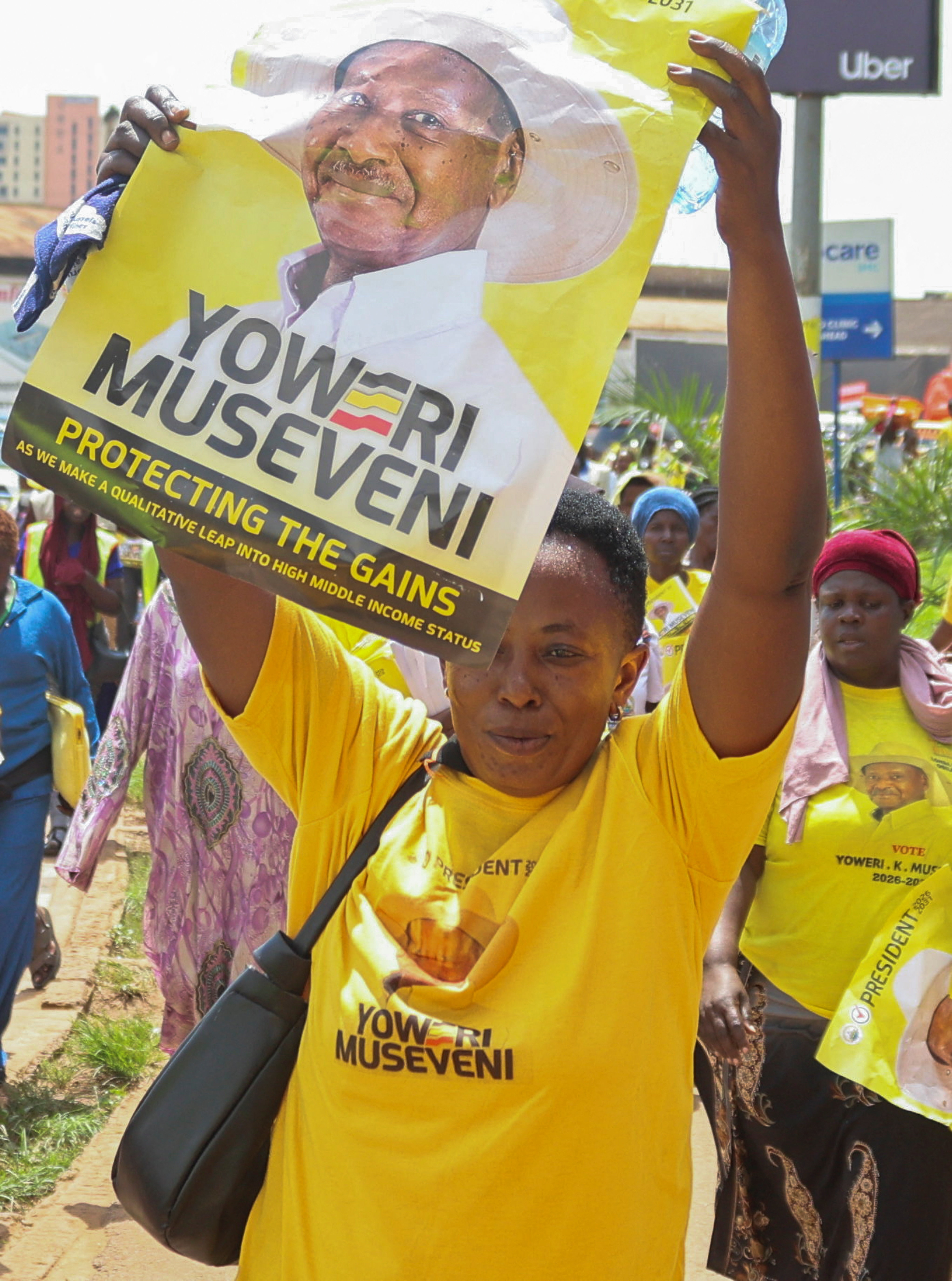 Supporters of Uganda's President and the leader of ruling NRM party Yoweri Museveni, attend his campaign rally in Kampala