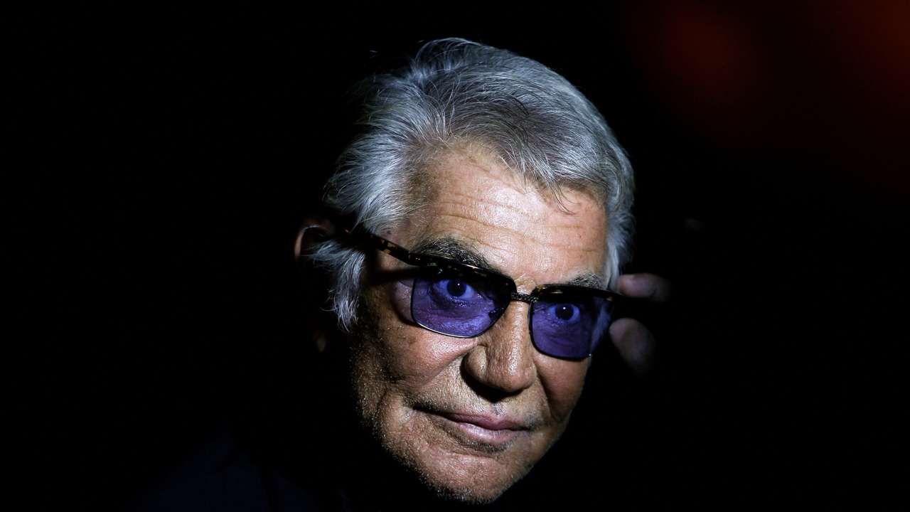 FILE PHOTO: Cavalli poses before the start of his Spring/Summer 2014 collection during Milan Fashion Week