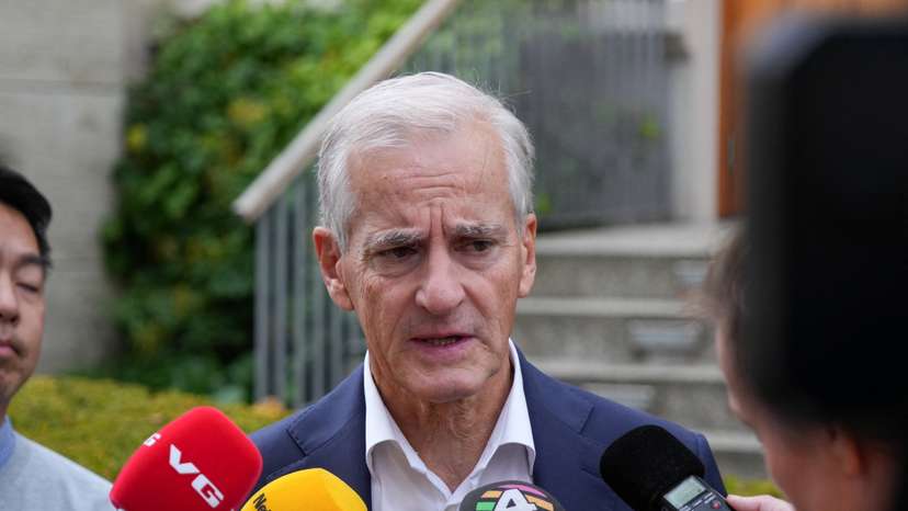 Norwegian re-elected PM Stoere talks to media in Oslo