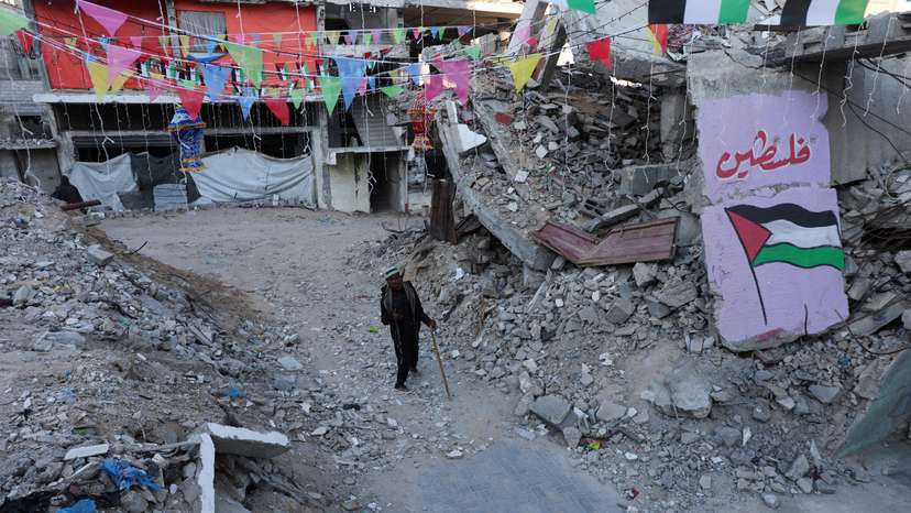 FILE PHOTO: Palestinians shop as they prepare for the upcoming holy fasting month of Ramadan, In Khan Younis