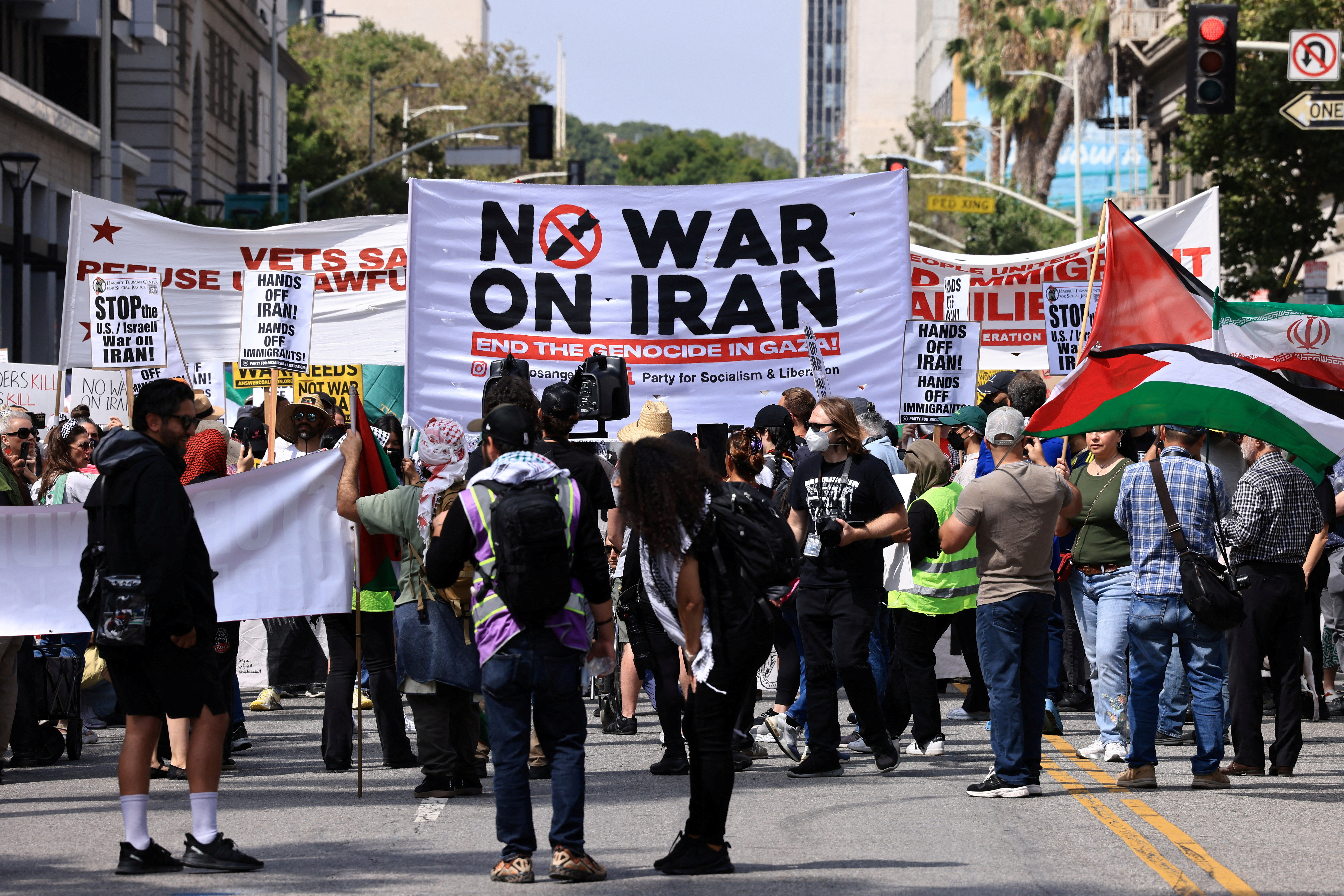 People attend an anti war demonstration in Los Angeles