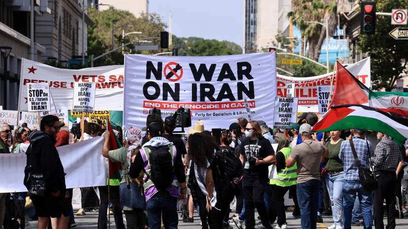 People attend an anti war demonstration in Los Angeles