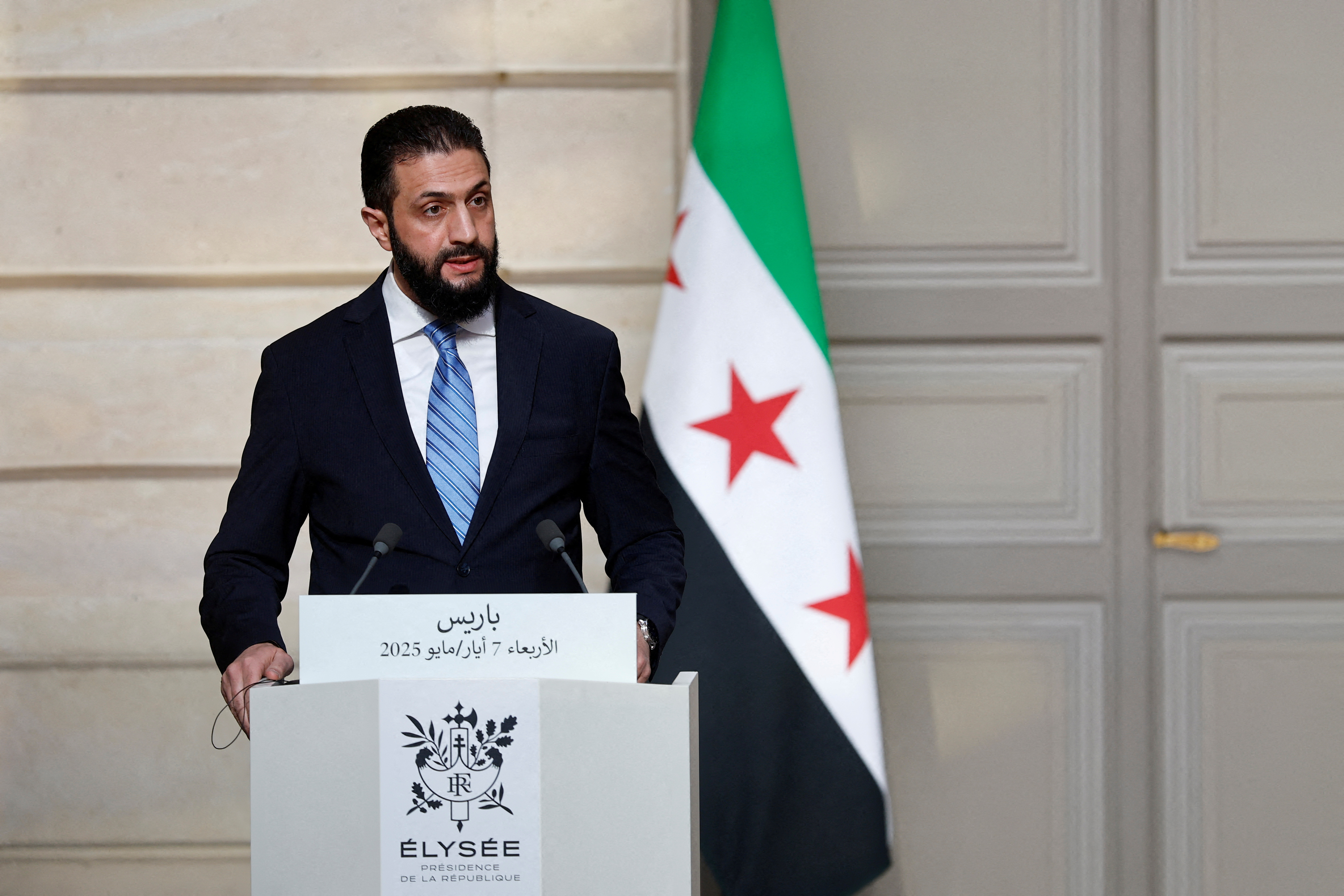 FILE PHOTO: French President Macron meets Syria's President Ahmed al-Sharaa in Paris