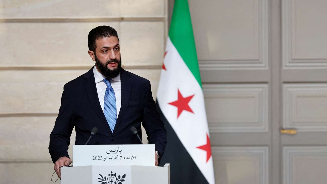 FILE PHOTO: French President Macron meets Syria's President Ahmed al-Sharaa in Paris