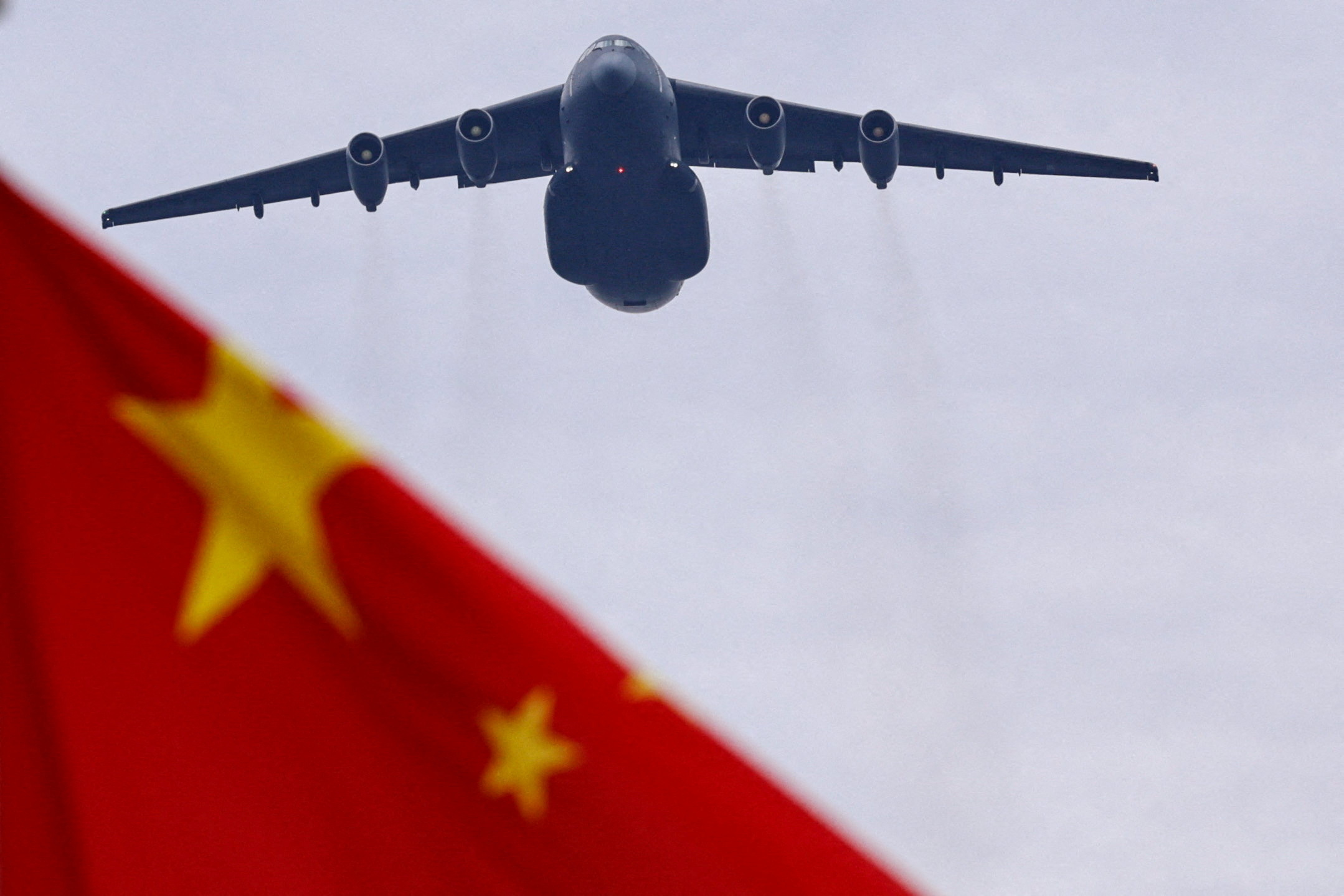 FILE PHOTO: Flyover rehearsal ahead of a military parade to mark the 80th anniversary of the end of World War Two, in Beijing