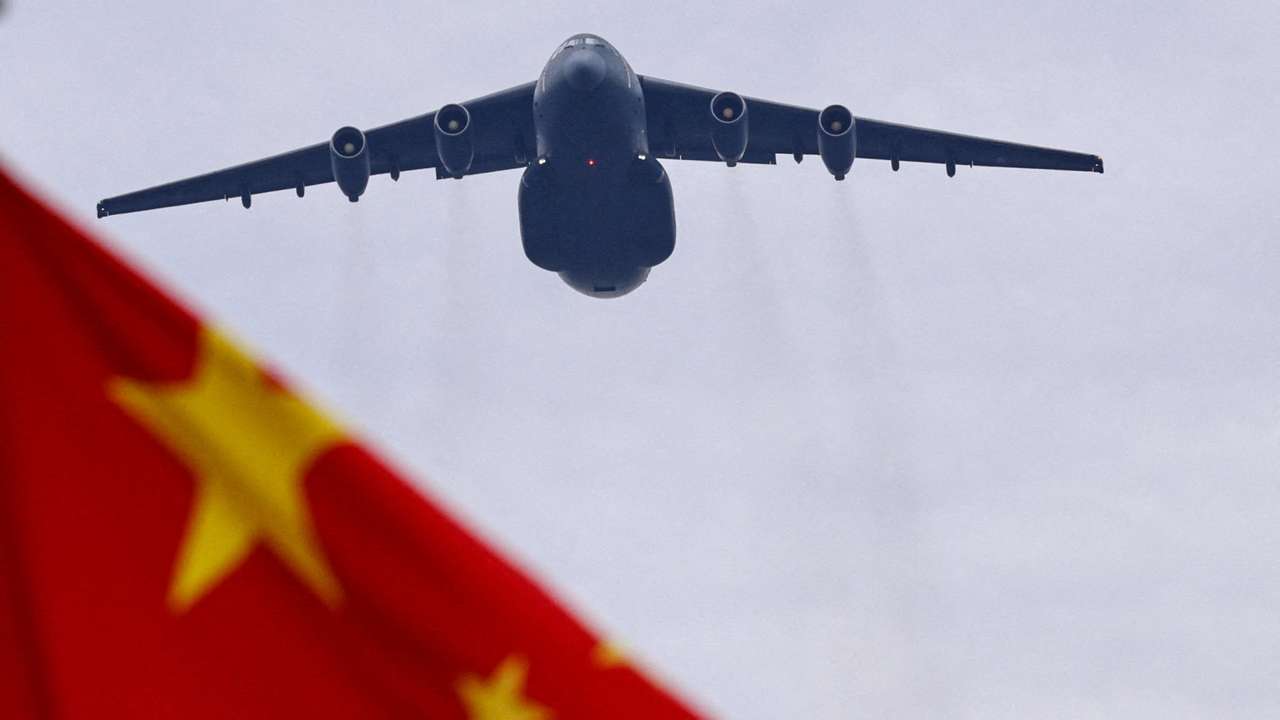 FILE PHOTO: Flyover rehearsal ahead of a military parade to mark the 80th anniversary of the end of World War Two, in Beijing