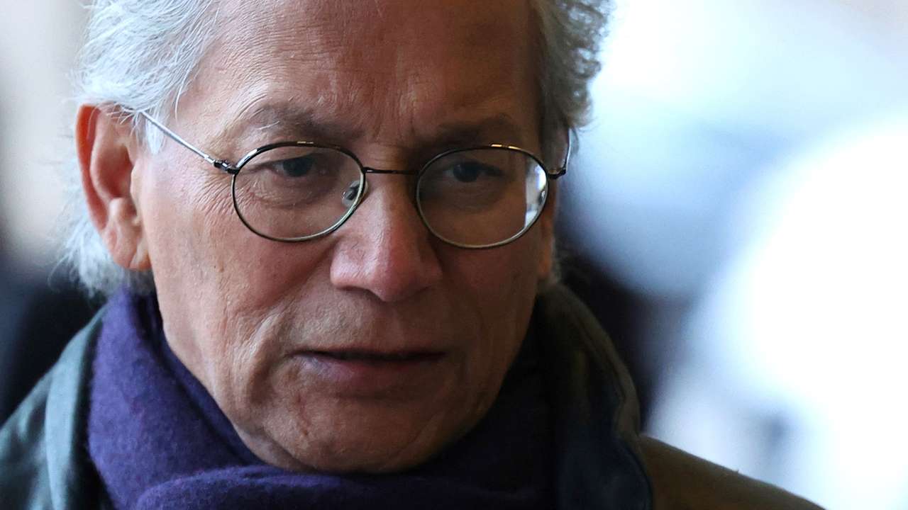 British television executive Shah arrives at the Houses of Parliament in London