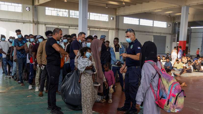 Newly-arrived migrants prepare to depart to mainland Greece, from Crete island