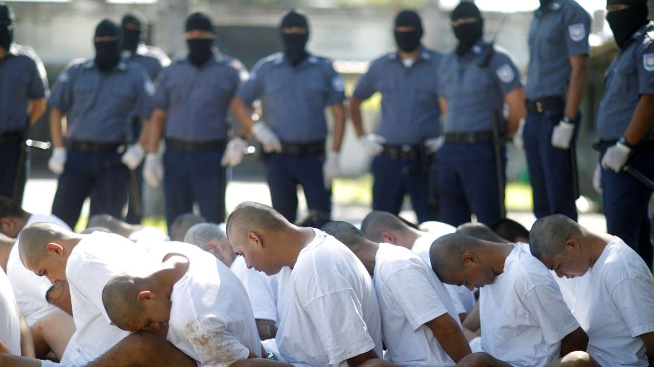 FILE PHOTO: Mara Salvatrucha (MS-13) gang members wait to be escorted upon arrival at the maximum-security jail in Zacatecoluca