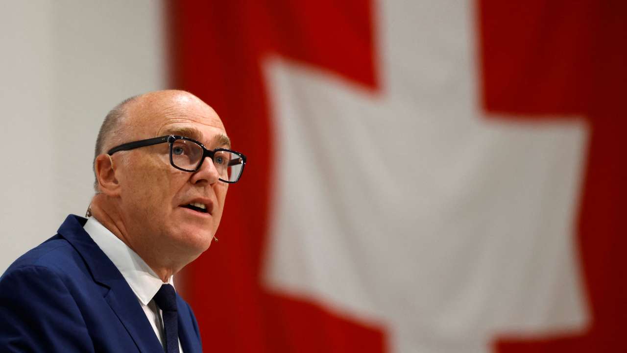 Swiss Federal Councillor Pfister speaks during a press conference as he visits Swiss army troops in Bure