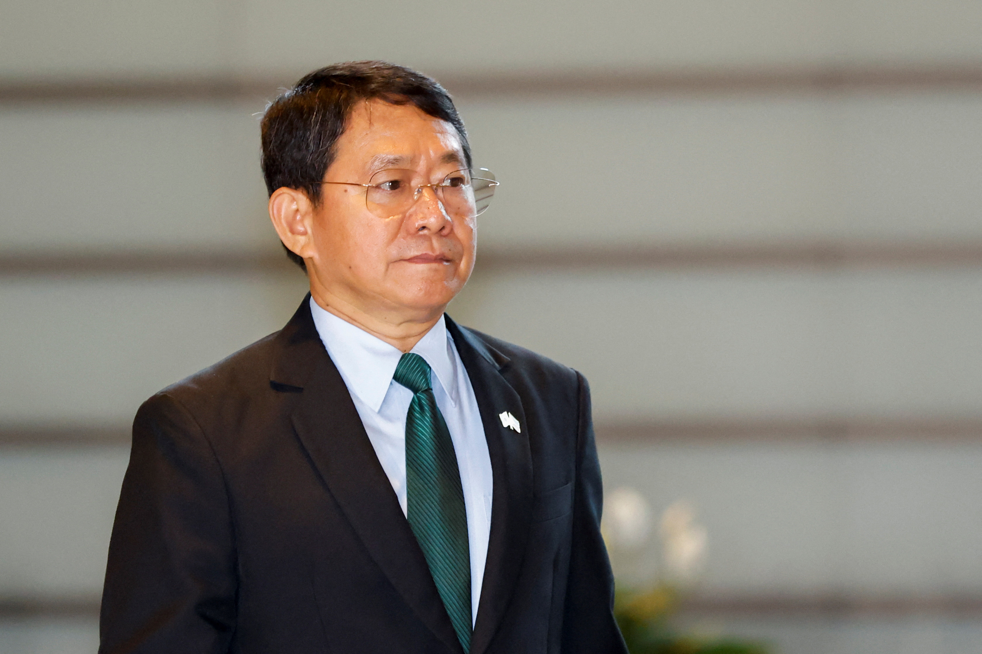 Philippine National Security Adviser Eduardo Ano arrives to meet Japanese Prime Minister Fumio Kishida at the prime minister's office in Tokyo