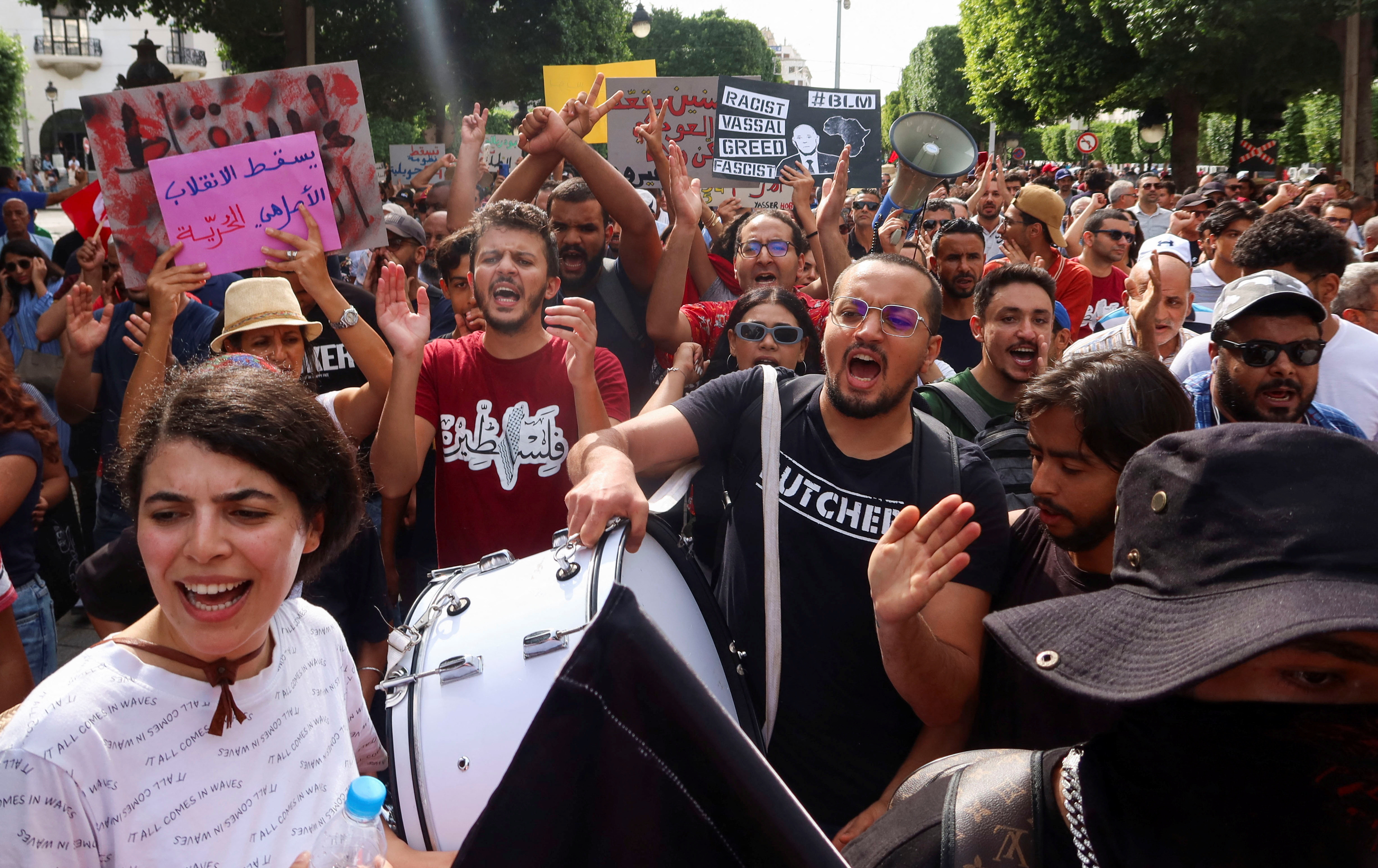 Demonstrators protest against President Kais Saied