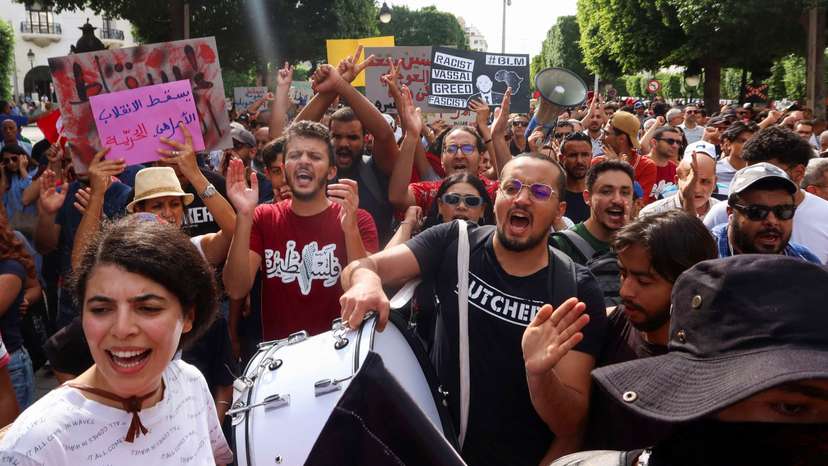 Demonstrators protest against President Kais Saied