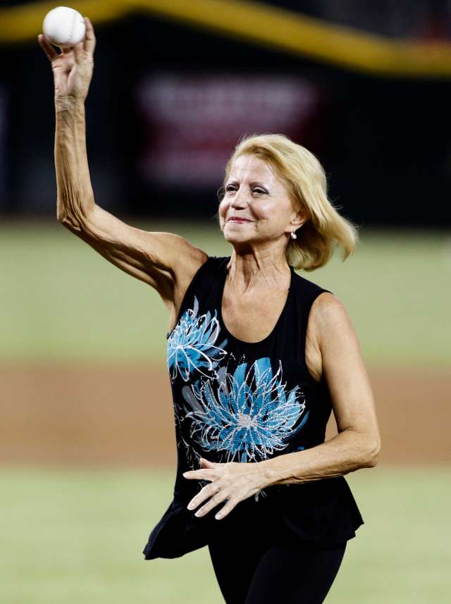 Former gymnast Korbut throws out first pitch before start of MLB interleague game between Toronto Blue Jays and Arizona Diamondbacks in Phoenix