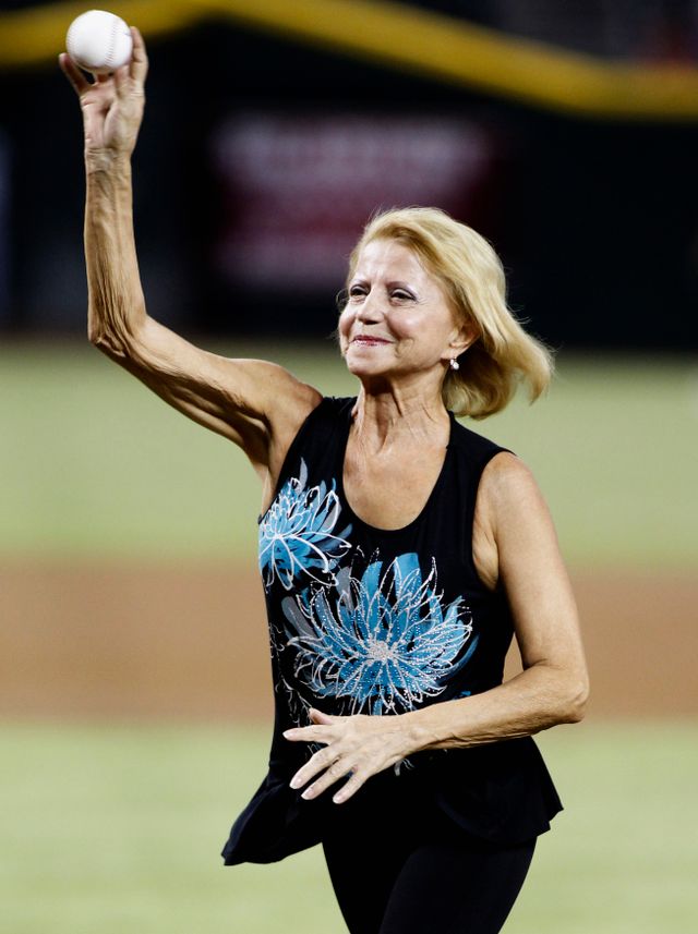 Former gymnast Korbut throws out first pitch before start of MLB interleague game between Toronto Blue Jays and Arizona Diamondbacks in Phoenix