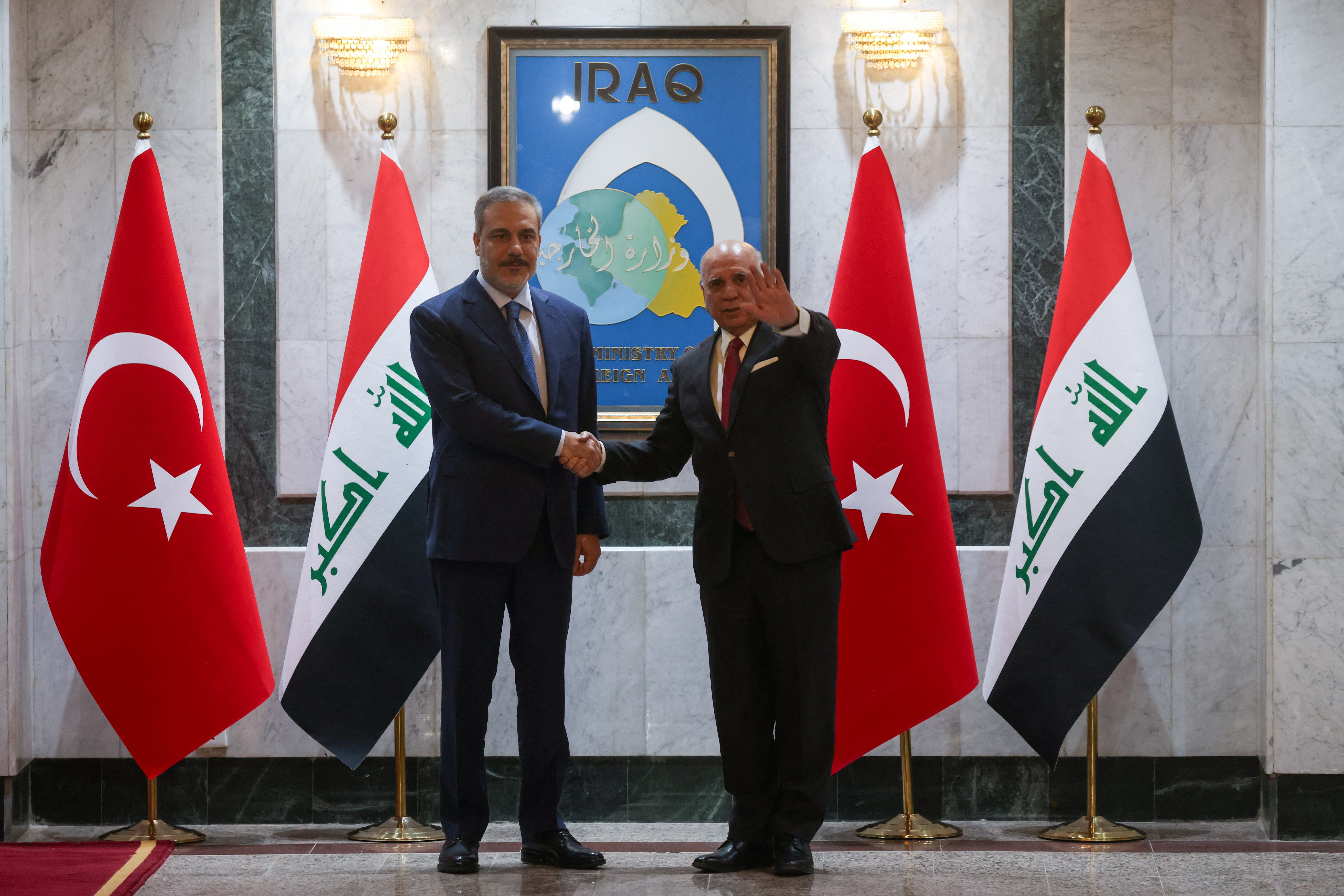 Turkey's FM Fidan meets with Iraq's FM Hussein, in Baghdad