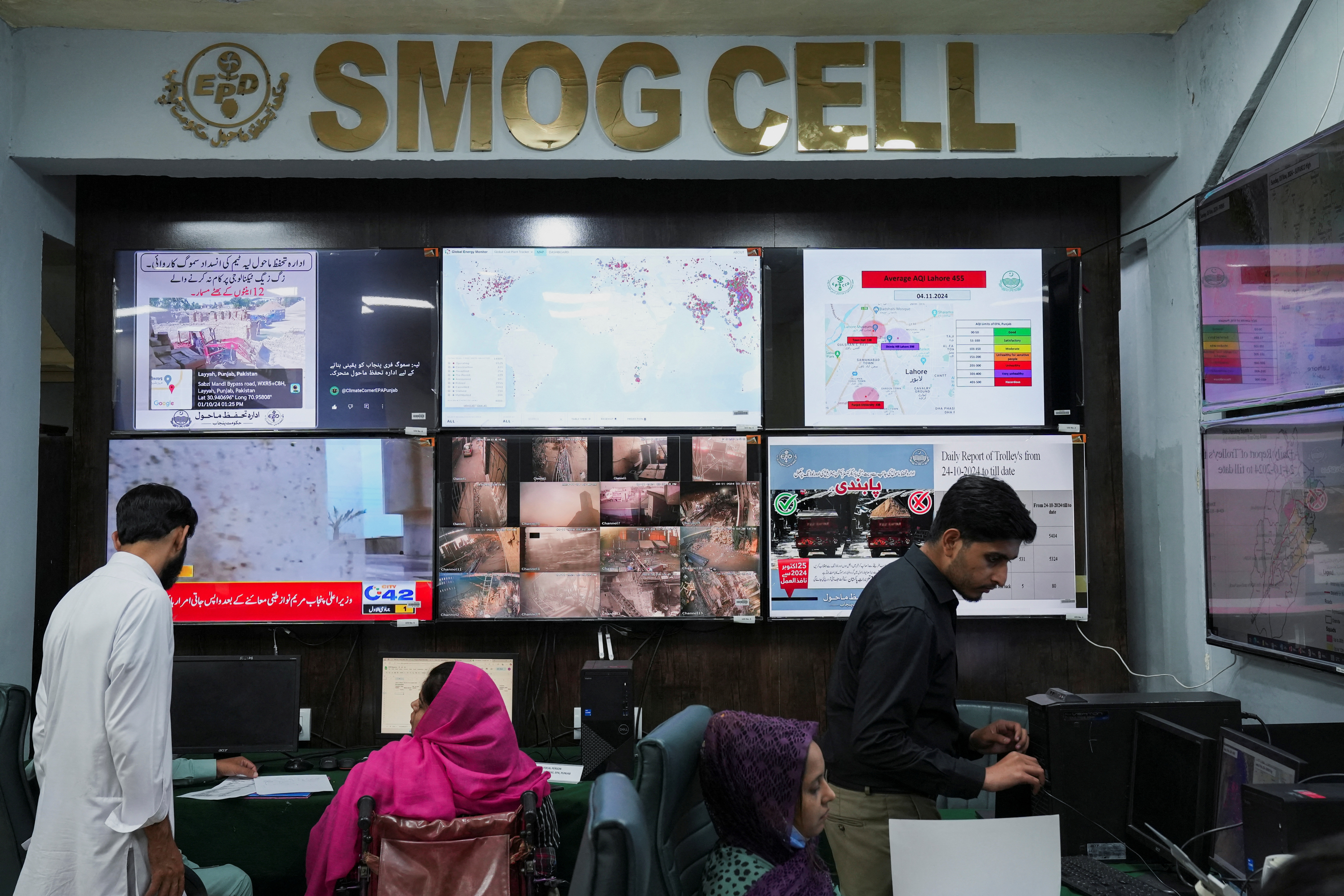 Monitor screens displaying the smog situation at the Smog Cell at the Environment Protection and Climate Change Department in Lahore