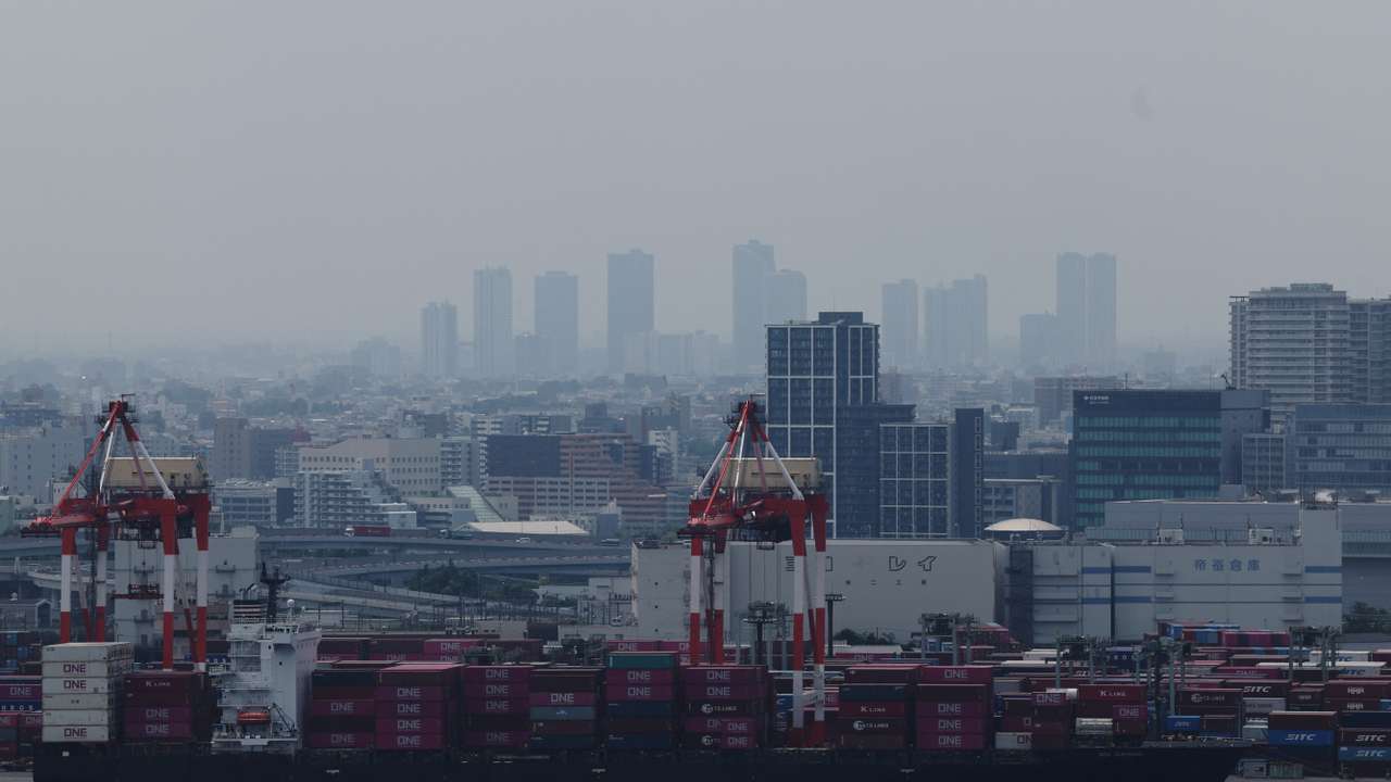 Containers are pictured at an industrial port in Tokyo