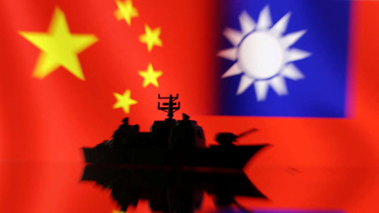 Illustration shows Chinese and Taiwanese flags