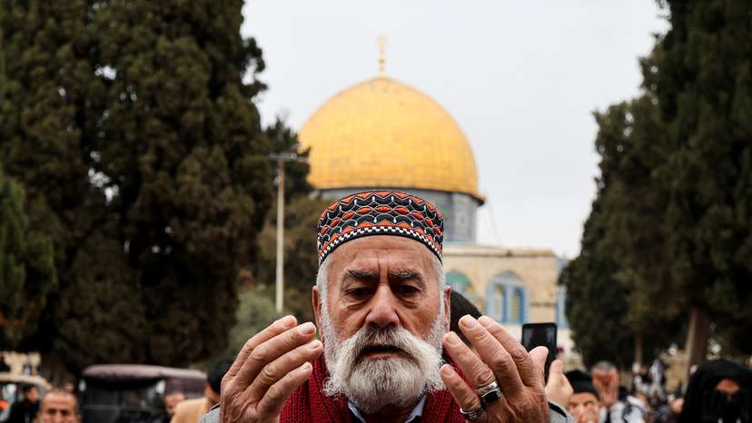 Muslim worshippers attend the first Friday prayers of Ramadan in Al-Aqsa compound