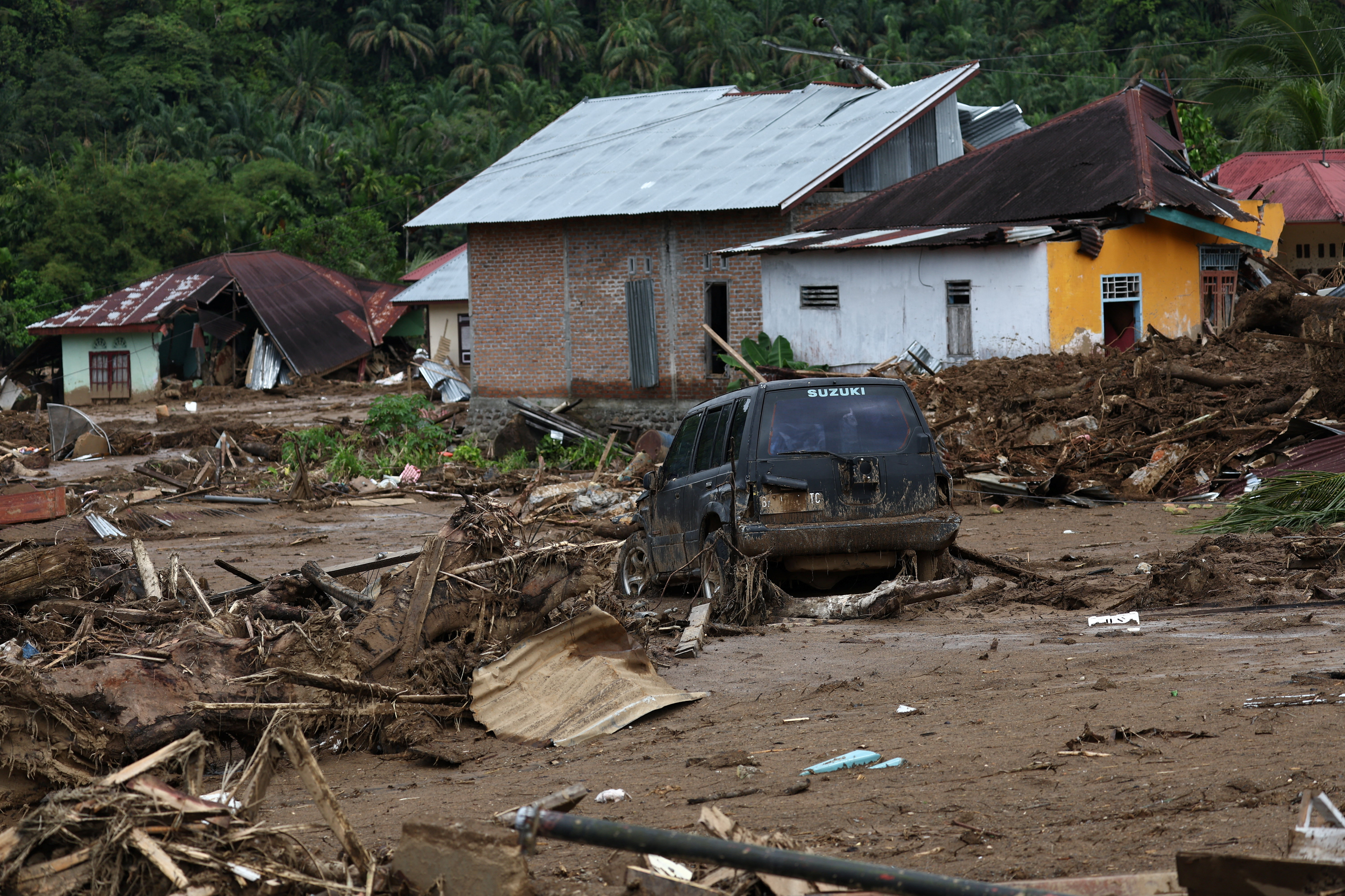 Rescue operations continue at an area hit by flash floods in Palembayan, Agam, West Sumatra