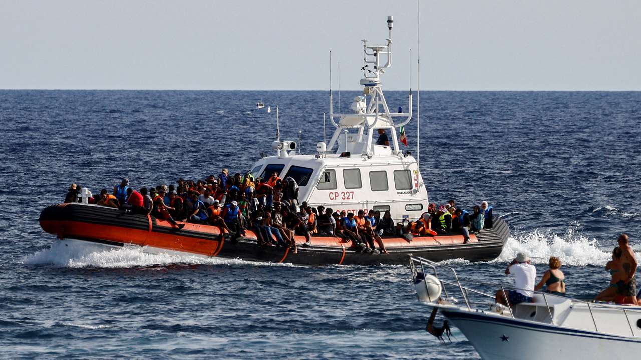 FILE PHOTO: Migrants in Lampedusa