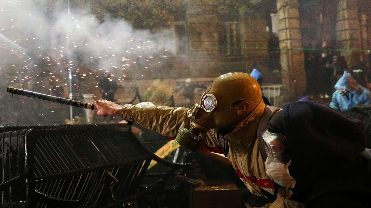 Georgian opposition supporters protest against government's EU application delay, in Tbilisi