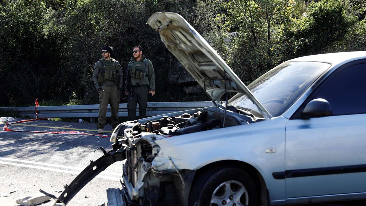 Israeli security forces gather at the site of a deadly shooting near Ramallah