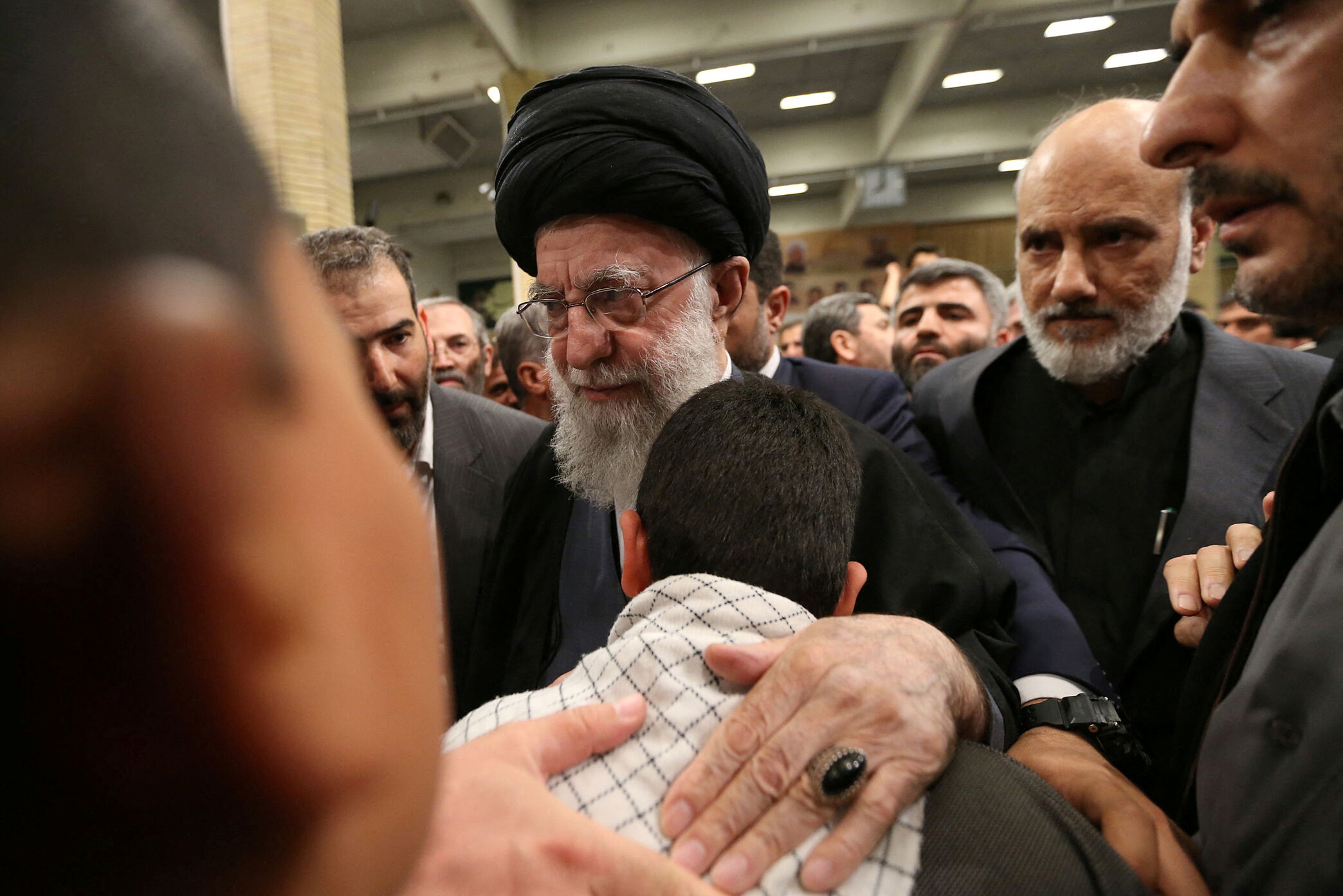 Iran's Supreme Leader, Ayatollah Ali Khamenei, meets with the family of one of the members of the Islamic Revolutionary Guard Corps, in Tehran