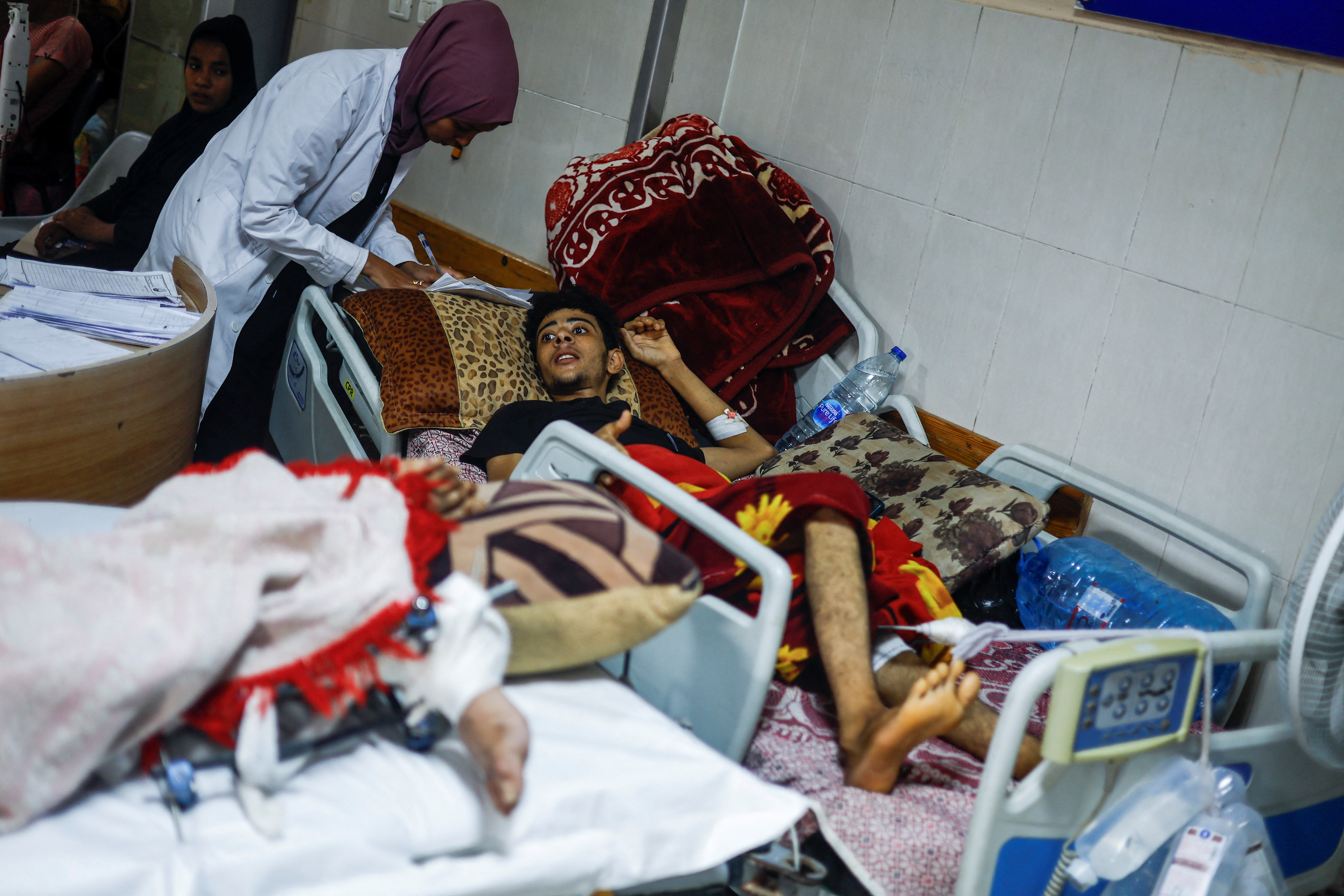 Palestinian patients transferred from the European Hospital to Nasser Hospital after the Israeli army's evacuation order of the eastern part of Khan Younis