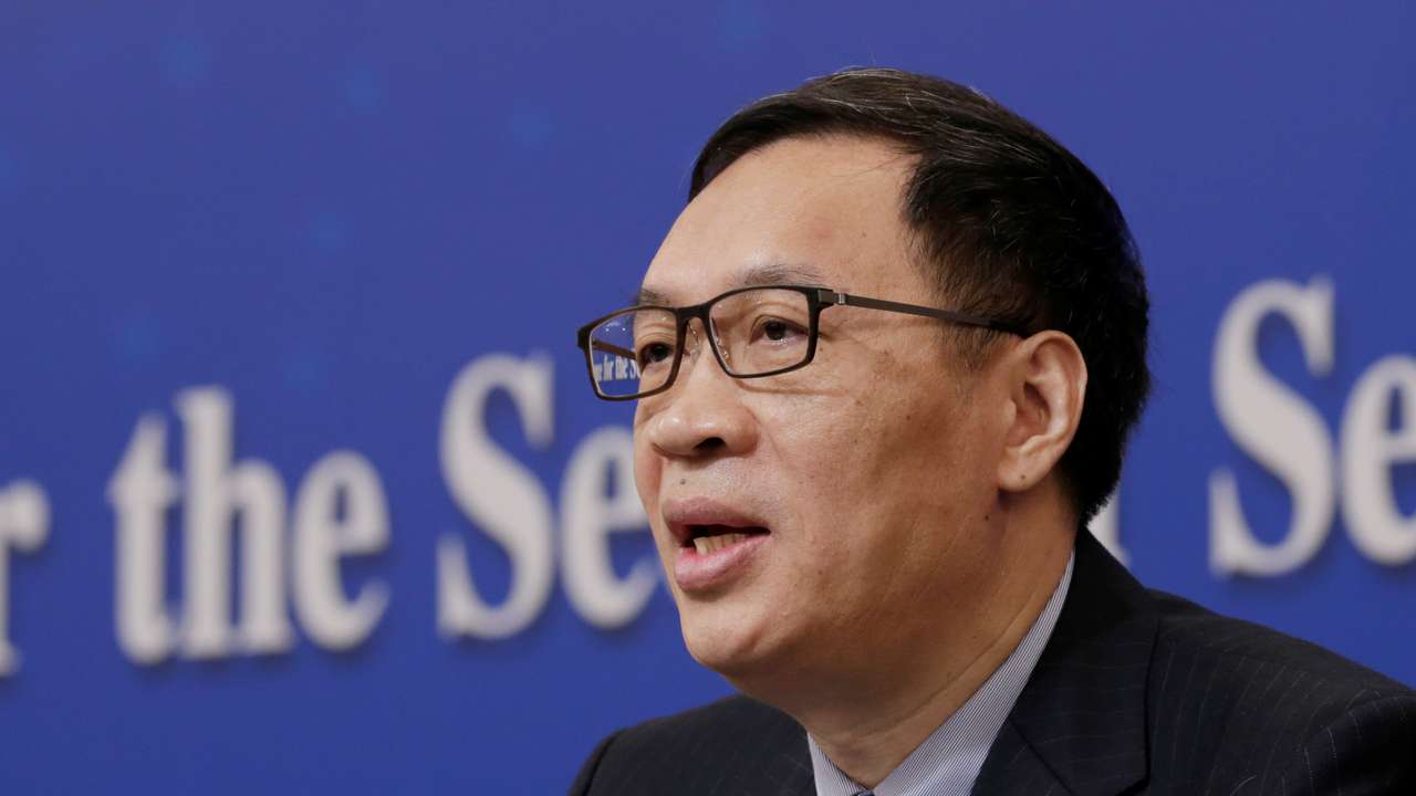 Fan Yifei, vice governor of the PBOC, attends a news conference during ongoing session of the NPC in Beijing