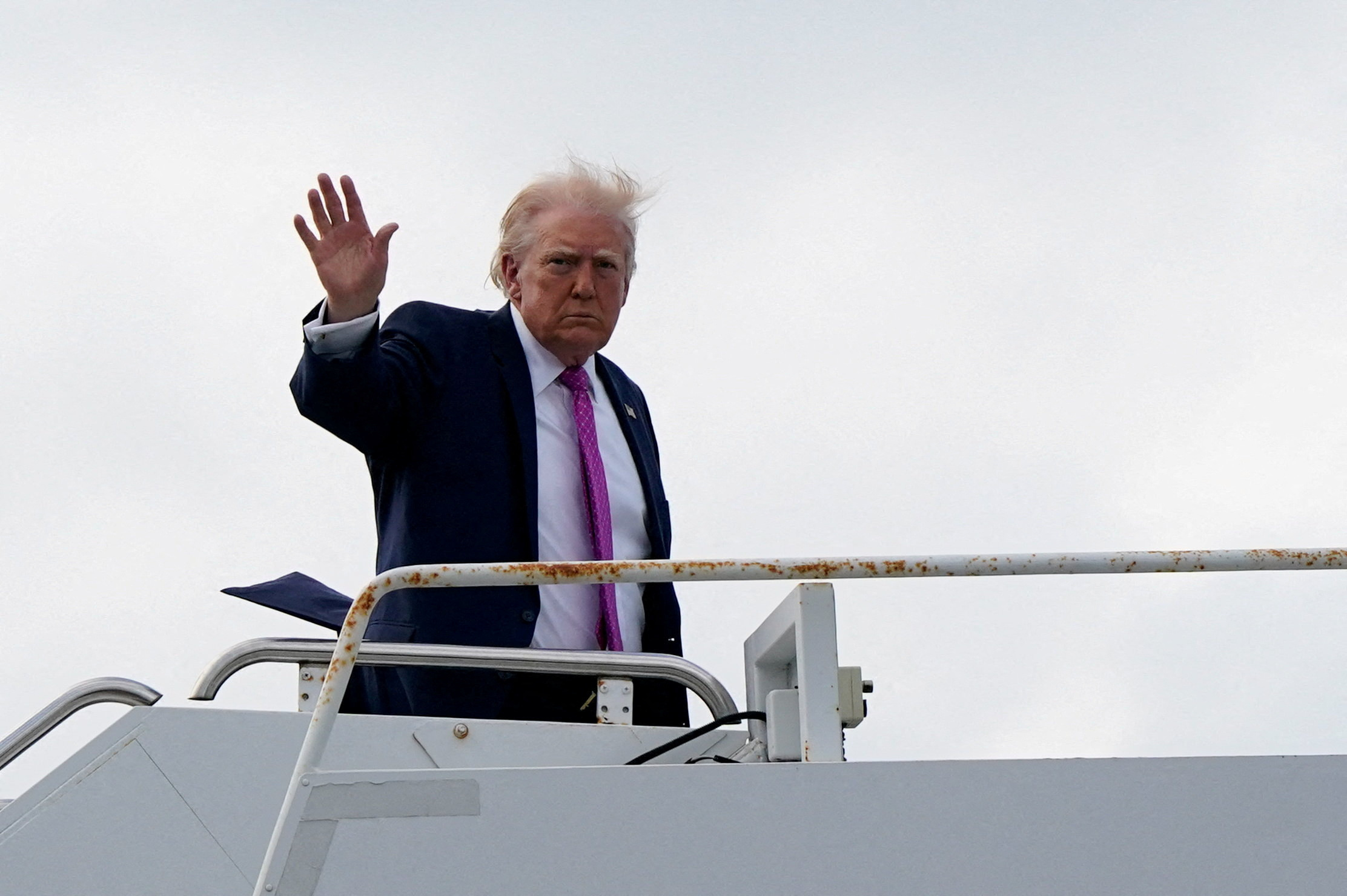 FILE PHOTO: U.S. President Donald Trump boards Air Force One at Palm Beach International Airport in West Palm Beach