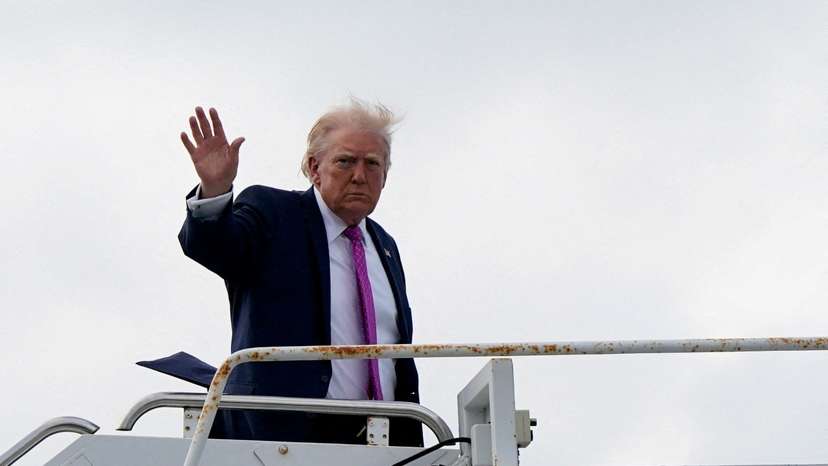 FILE PHOTO: U.S. President Donald Trump boards Air Force One at Palm Beach International Airport in West Palm Beach
