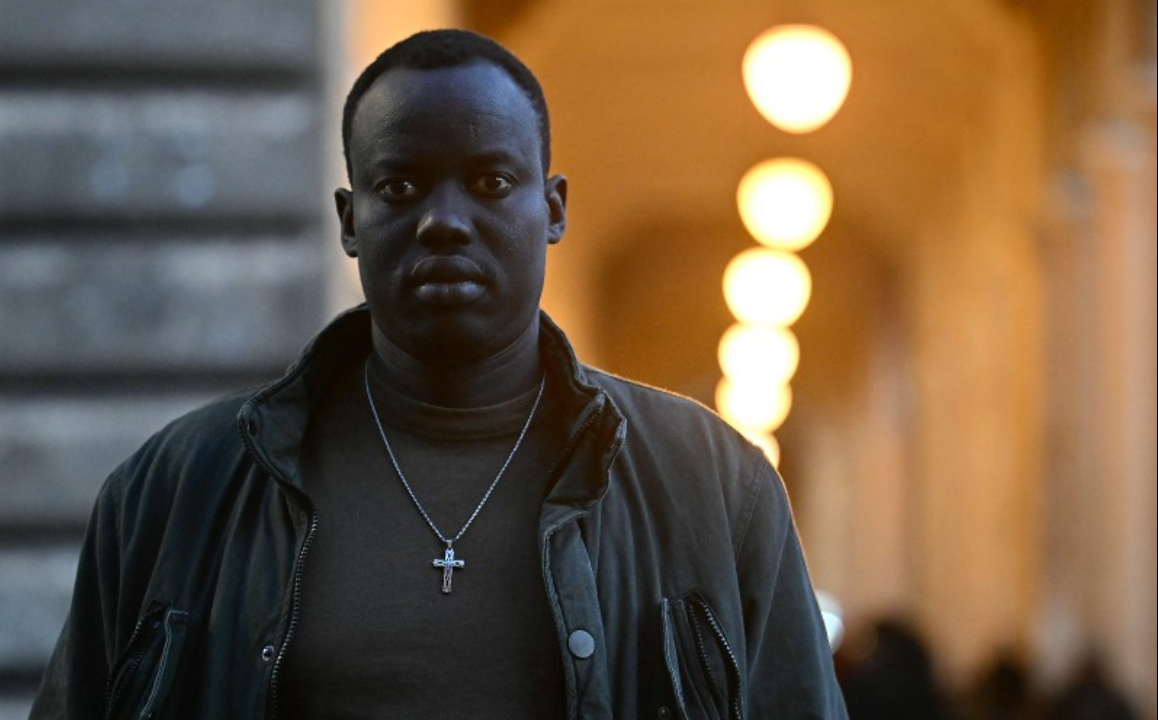 Lam Magok Biel Ruei, a migrant who filed a complaint against Prime Minister Giorgia Meloni and Ministers Nordio and Piantedosi in relation to the affair of Libyan General Osama Almasri wanted by International Criminal Court for crimes against humanity poses, on February 5, 2025 in Rome. Osama Almasri Najim, the head of Libya's judicial police, was arrested in Turin on January 19 on an ICC warrant, only to be released and flown home to Tripoli two days later on an Italian air force plane. (Photo by Filippo MONTEFORTE / AFP)