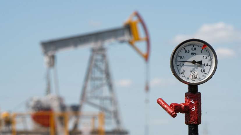 A view shows a pressure gauge near oil pump jacks outside Almetyevsk