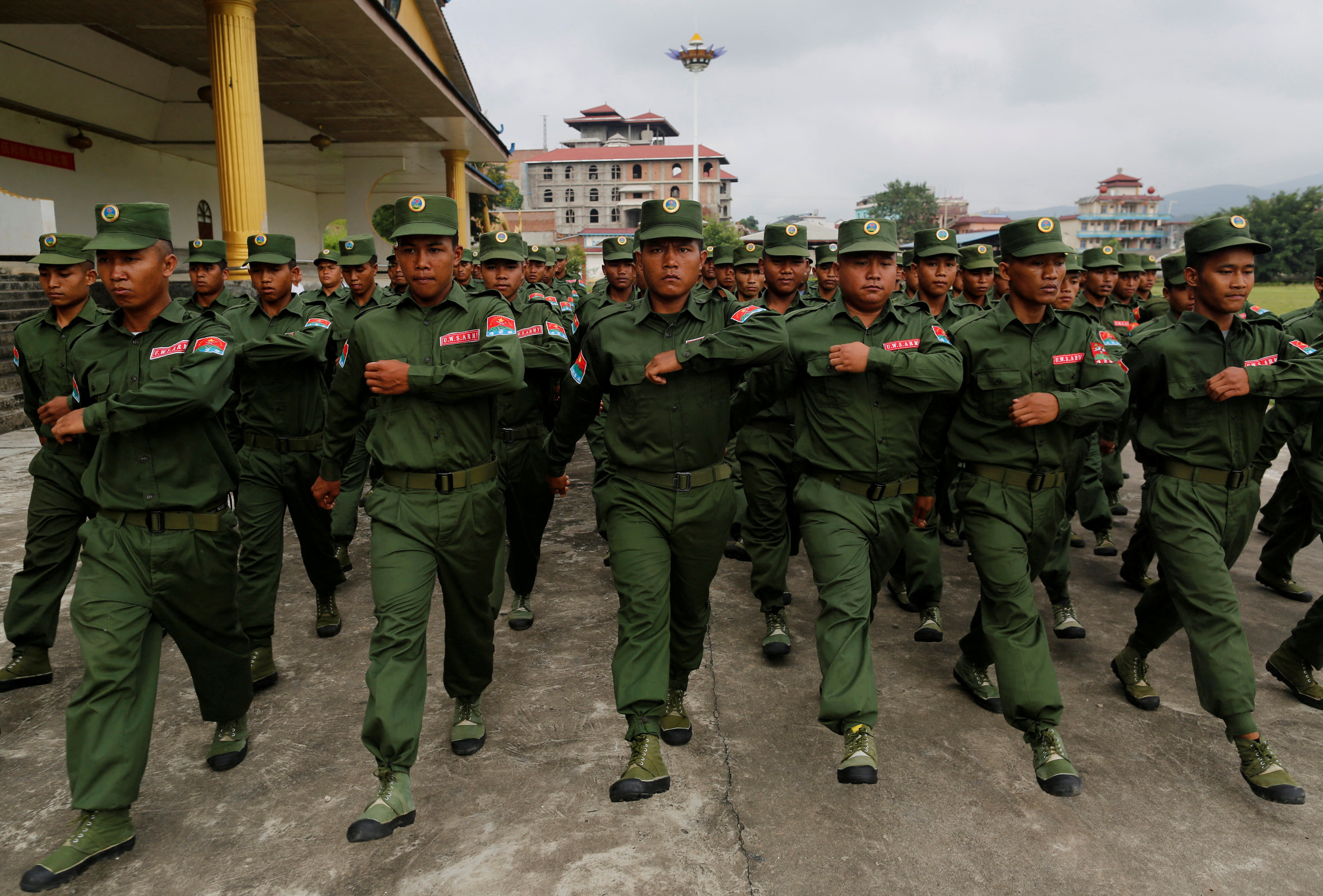 United Wa State Army (UWSA) soldiers march during a media display in Pansang, Wa territory in northeast Myanmar