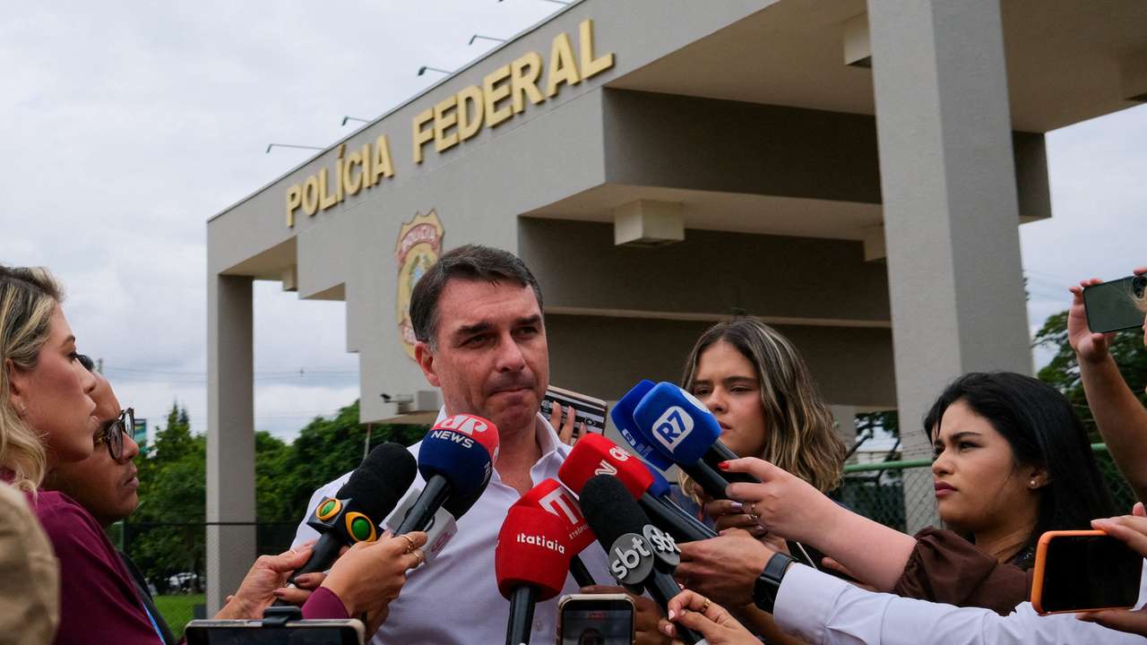FILE PHOTO: Senator Flavio Bolsonaro visits his father at a Federal Police building in Brasilia
