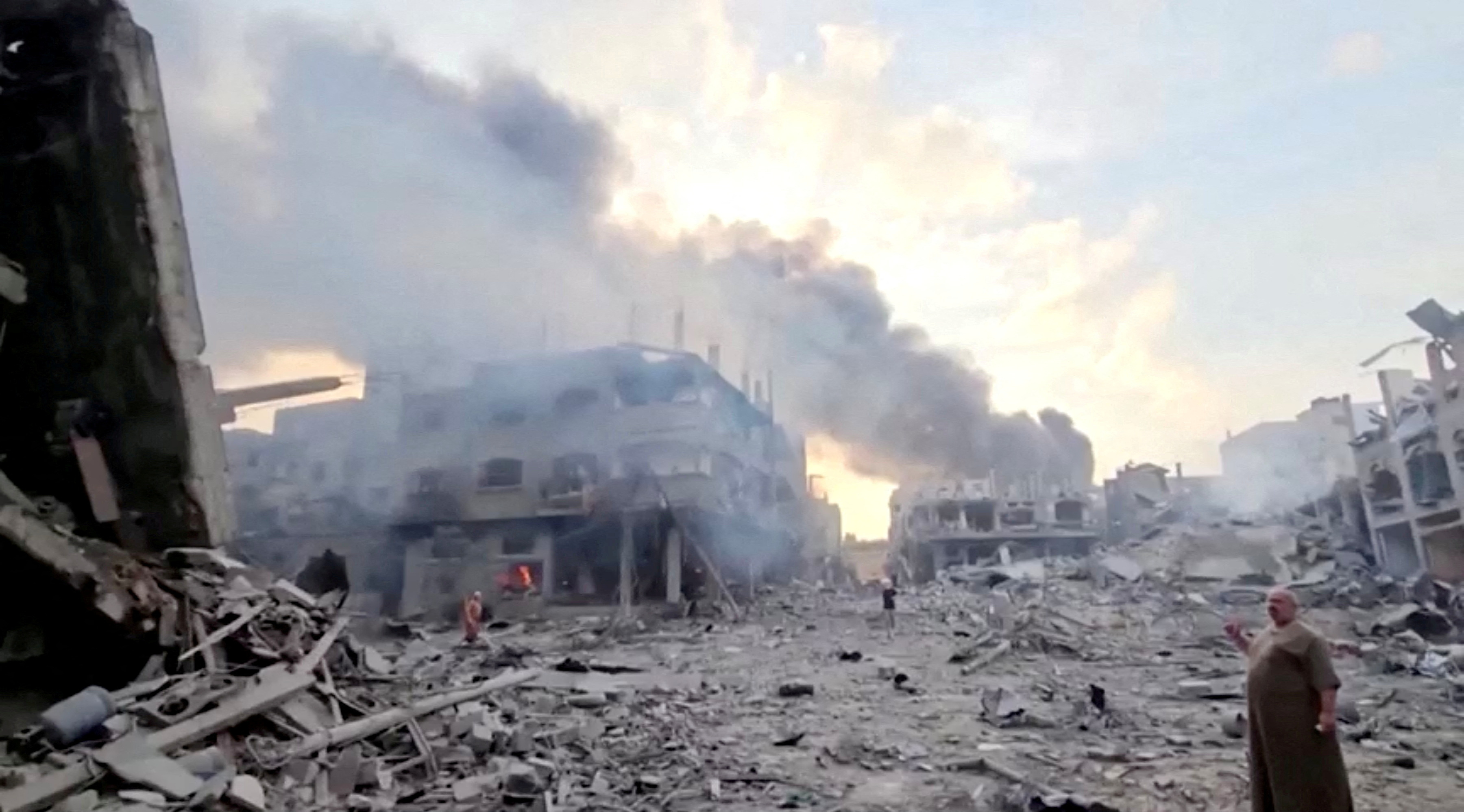 FILE PHOTO: Smoke billows over flattened buildings in Gaza's Jabalia camp