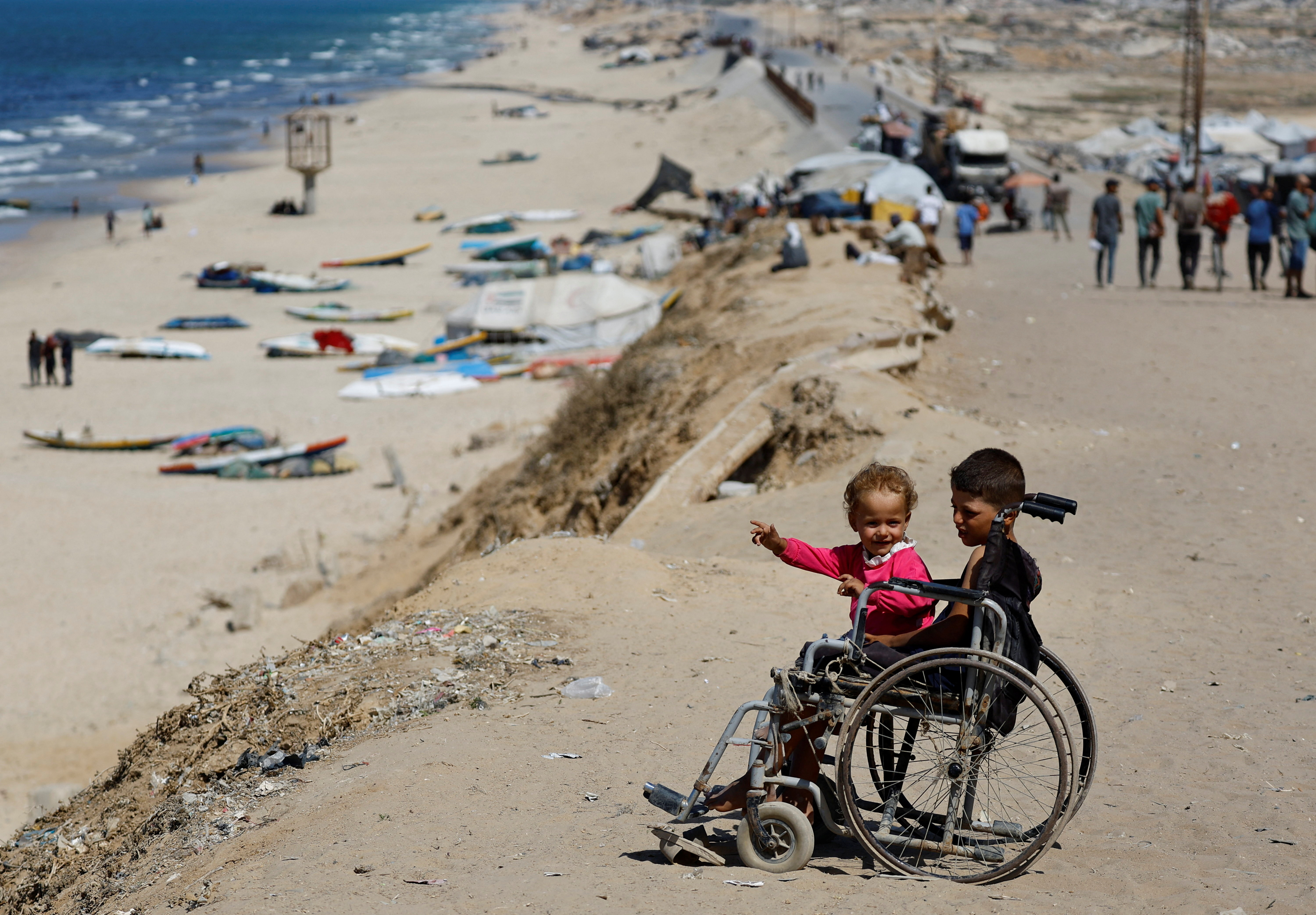Displaced Palestinians shelter, in the central Gaza Strip