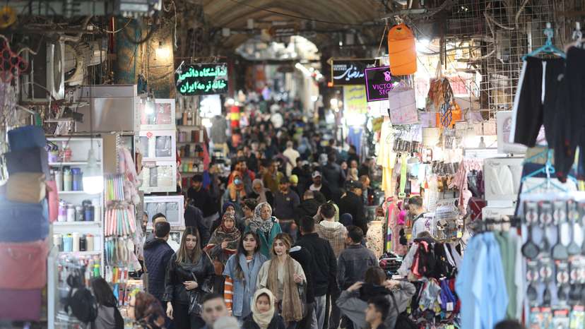 FILE PHOTO: Iranian people shop at the Tehran Bazaar in Tehran