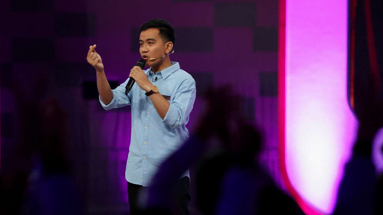 FILE PHOTO: The eldest son of Indonesian President Joko Widodo, vice presidential candidate Gibran Rakabuming Raka, gestures during a televised debate at the Jakarta Convention Center in Jakarta