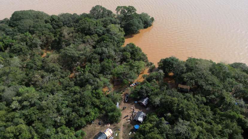 Indigenous Brazil community stays on flooded land in dispute with developer