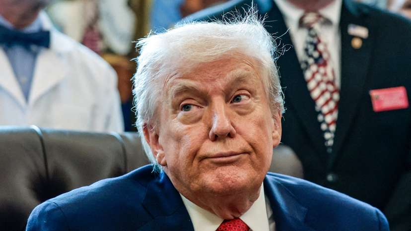 U.S. President Trump signs executive orders at the Oval Office, in Washington