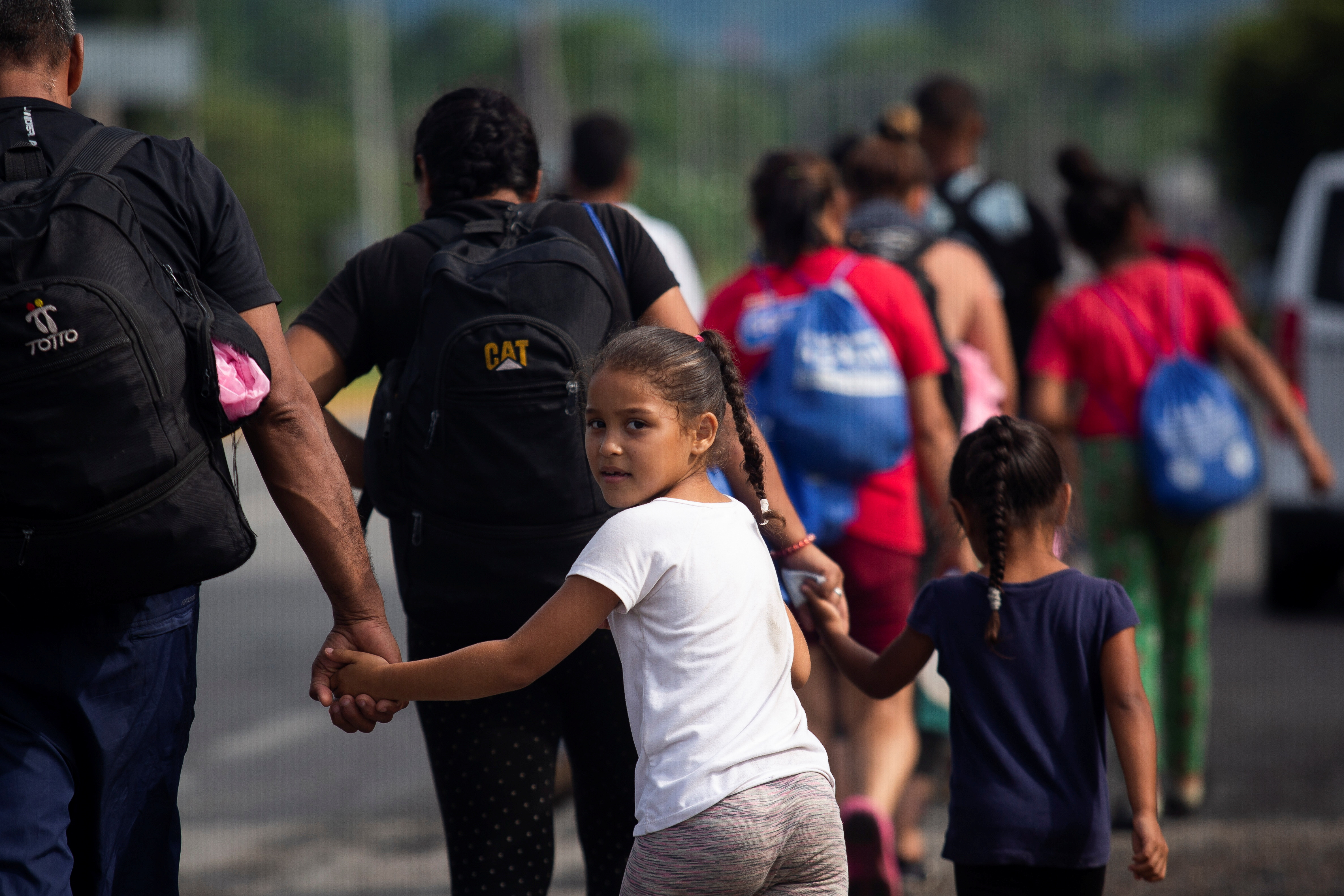 Migrants take part in a new U.S.-bound caravan in southern Mexico