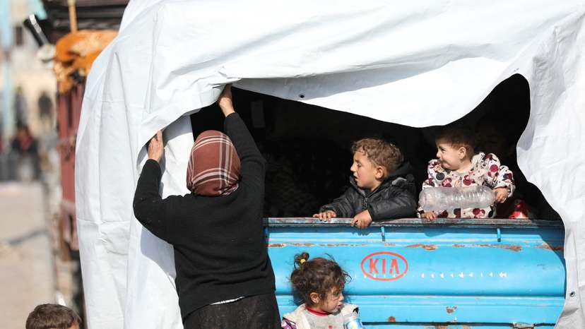 Displaced children who fled Aleppo countryside stand in Tabqa
