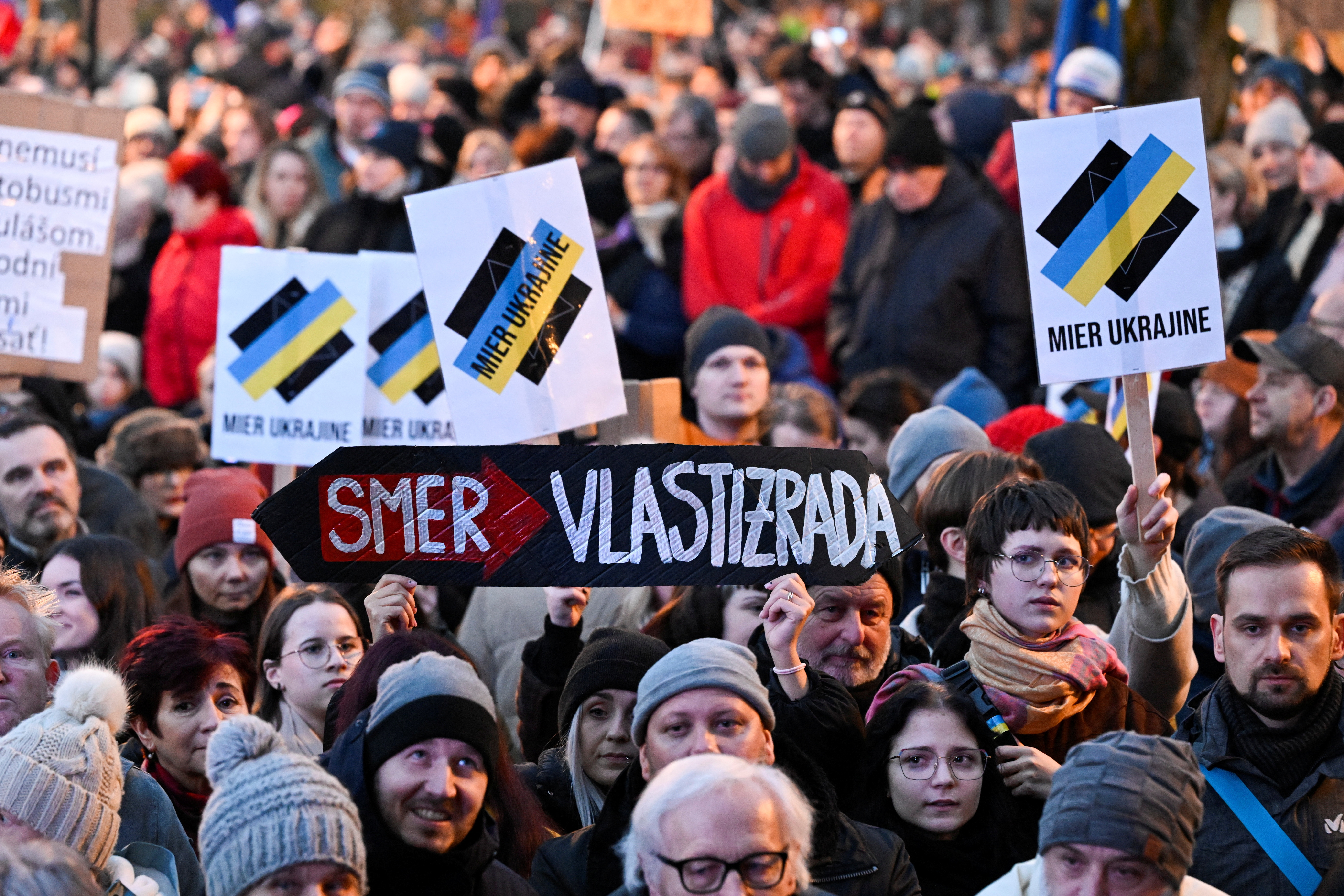 Demonstrators attend an anti-government protest in Bratislava