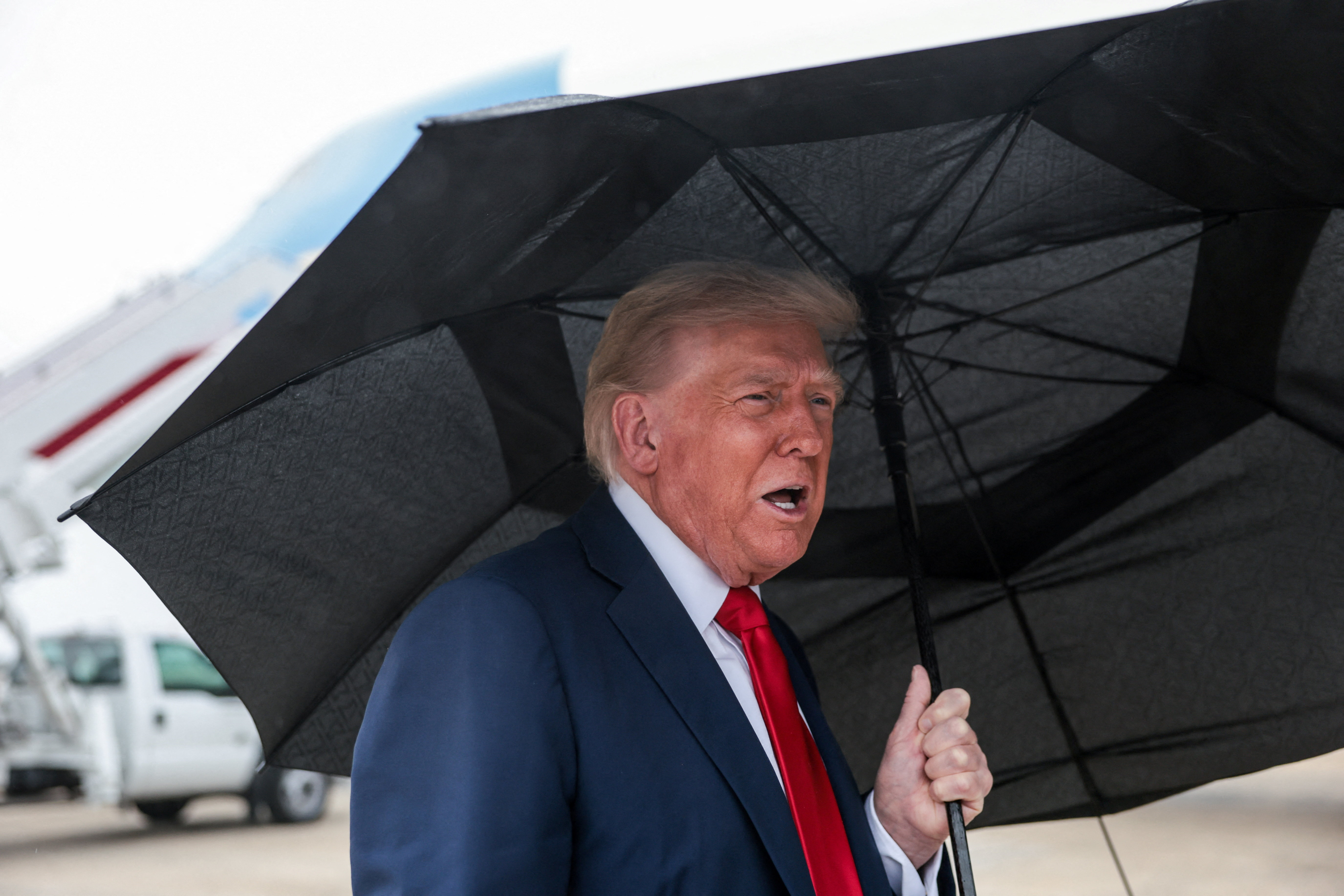 U.S. President Trump boards Air Force One as he departs for Israel, at Joint Base Andrews