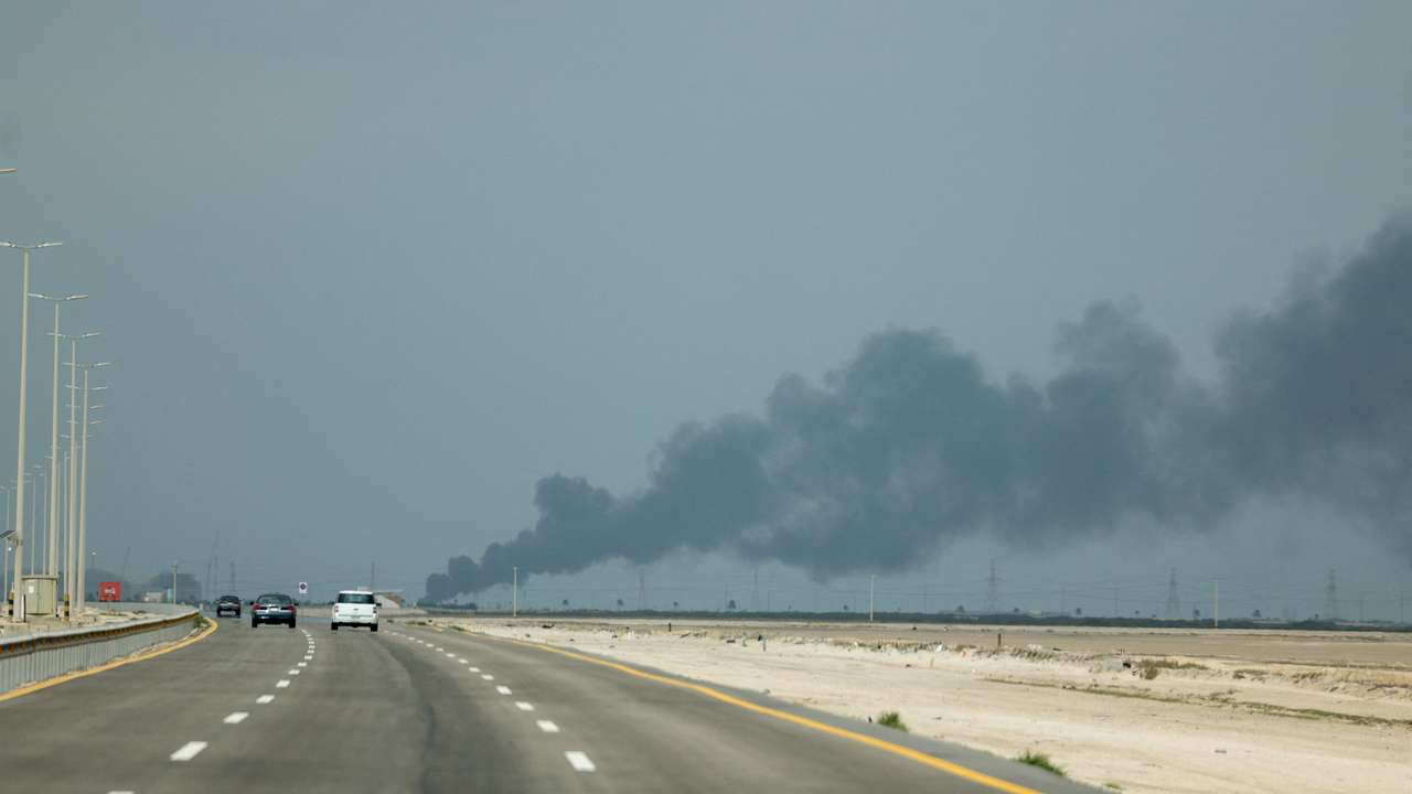 FILE PHOTO: Smoke billows from Saudi Aramco's Ras Tanura oil refinery after a reported Iranian drone strike