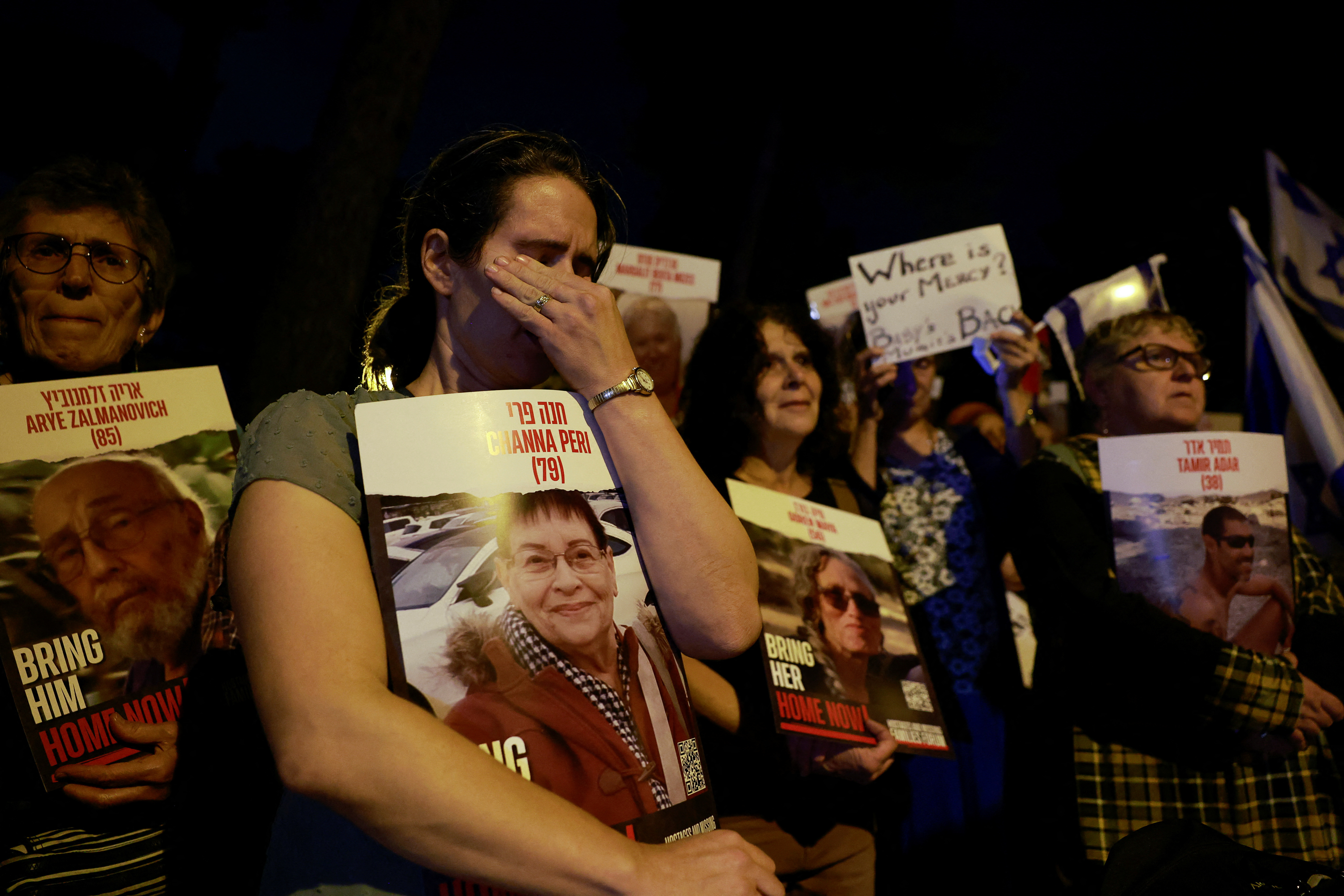 People gather in front of the United Nations Headquarters demanding for action to be taken to return the hostages kidnapped by Hamas, in Jerusalem