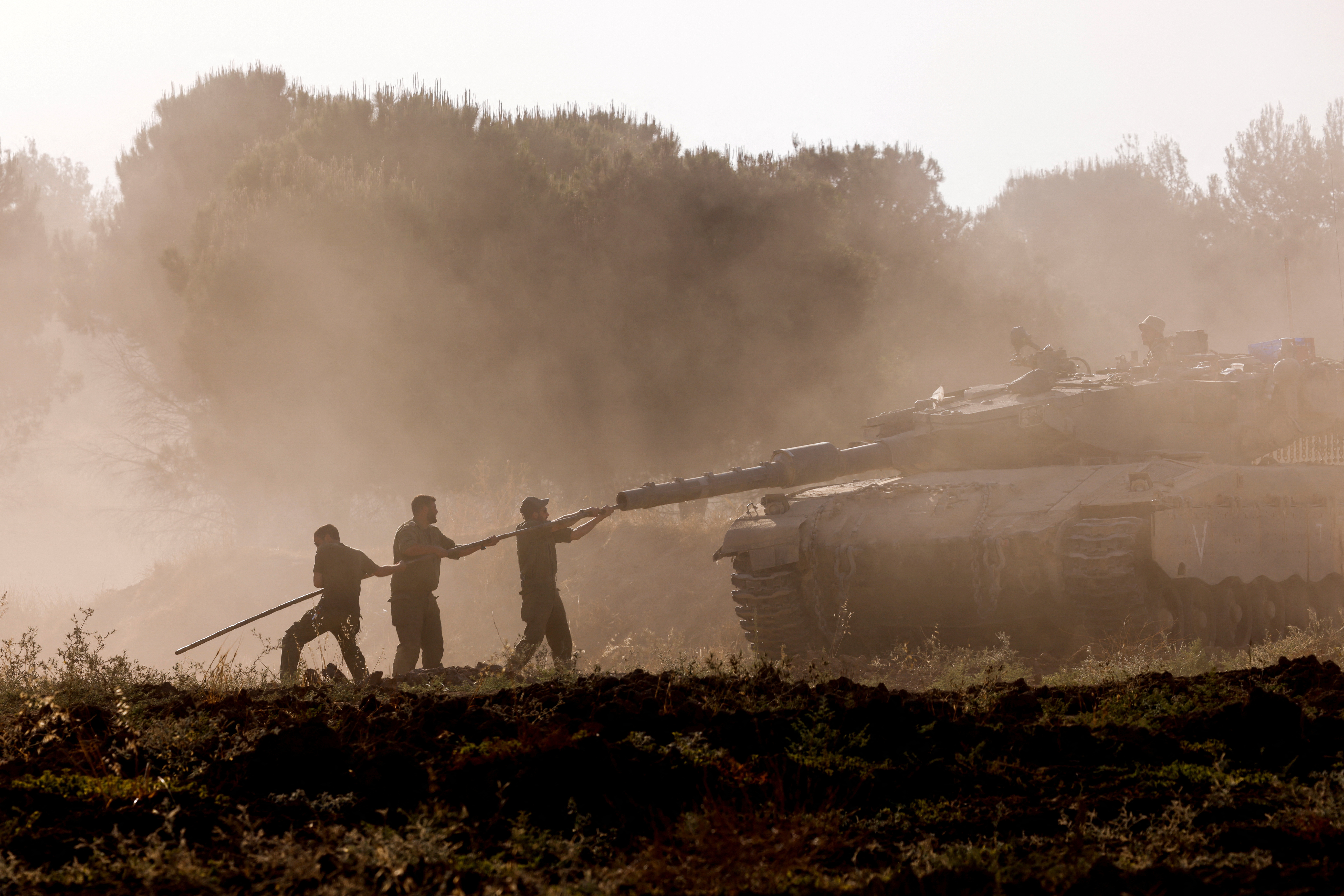 Israeli soldiers return from Gaza Strip, near the Israel-Gaza border